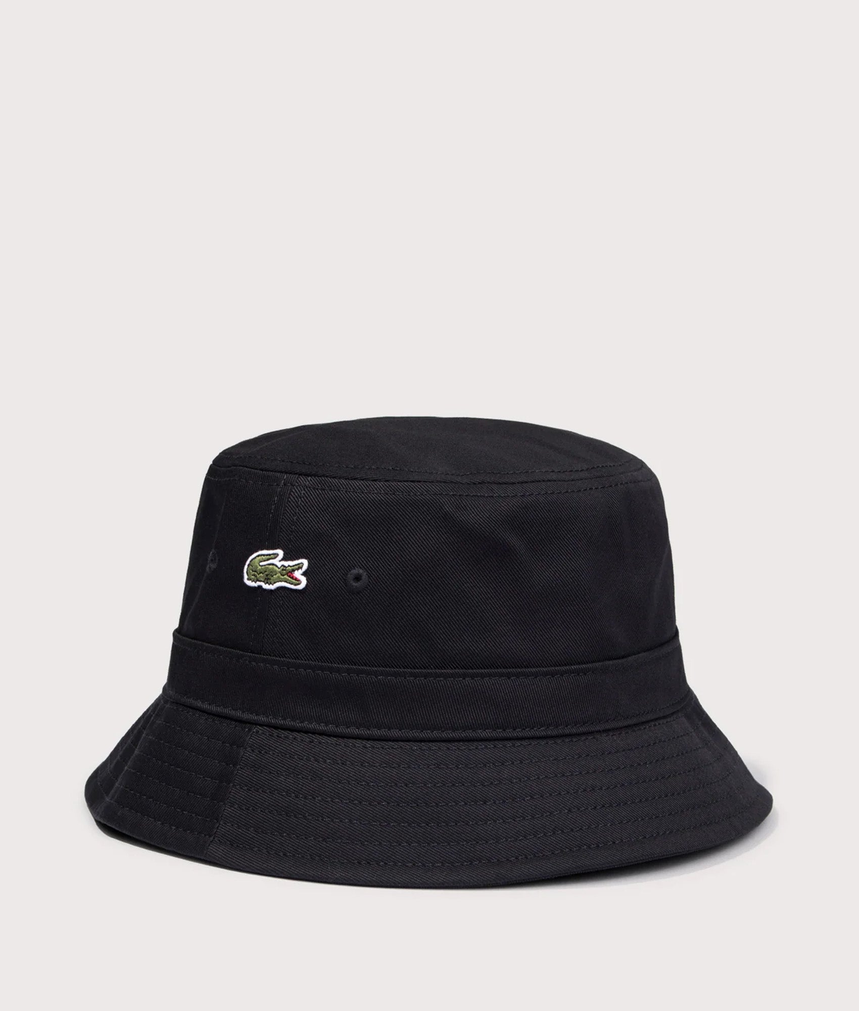 Piqué Bucket Hat in Black by Lacoste. Angled front shot.