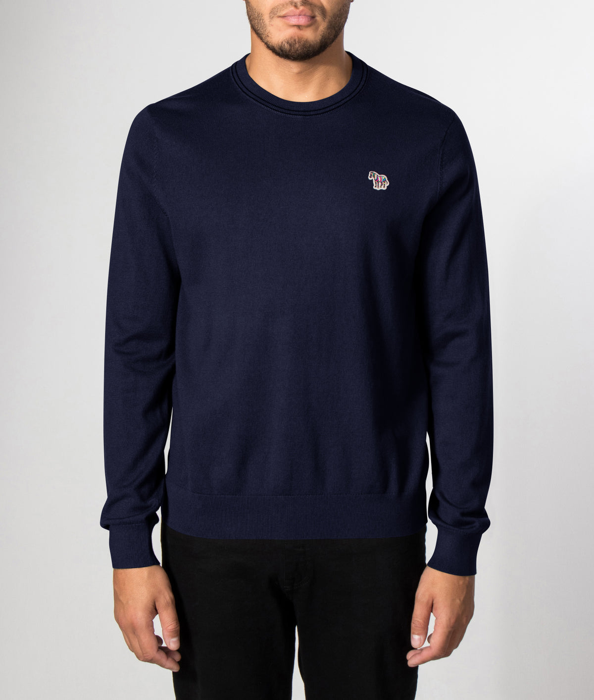 PS Paul Smith Regular Fit Zebra Logo Crewneck jumper in Very Dark Navy at EQVVS Menswear. Front model shot.