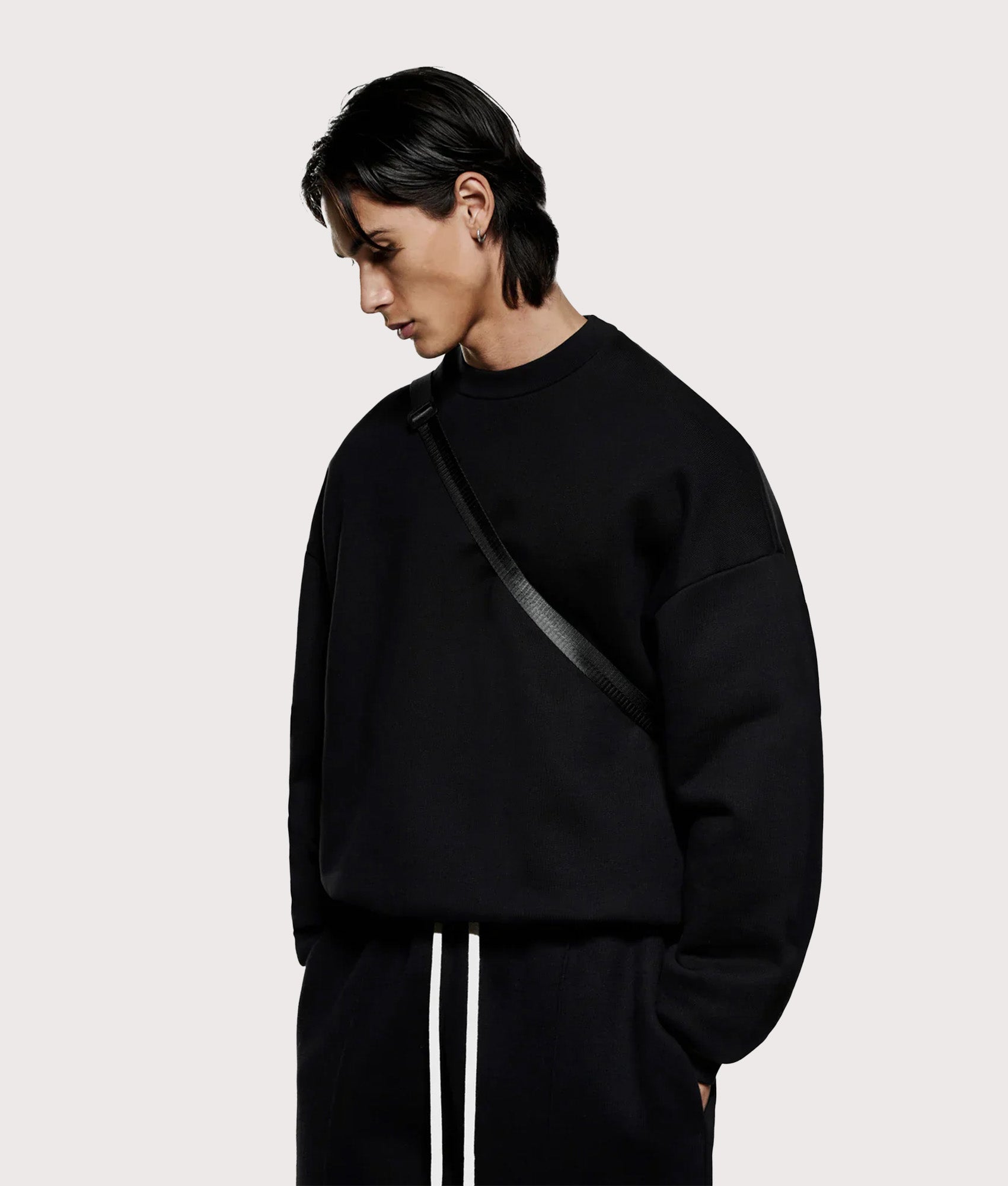 MKI Miyuki Zoku 800 GSM Superweight Crewneck Sweatshirt in Black at EQVVS. Model front shot.