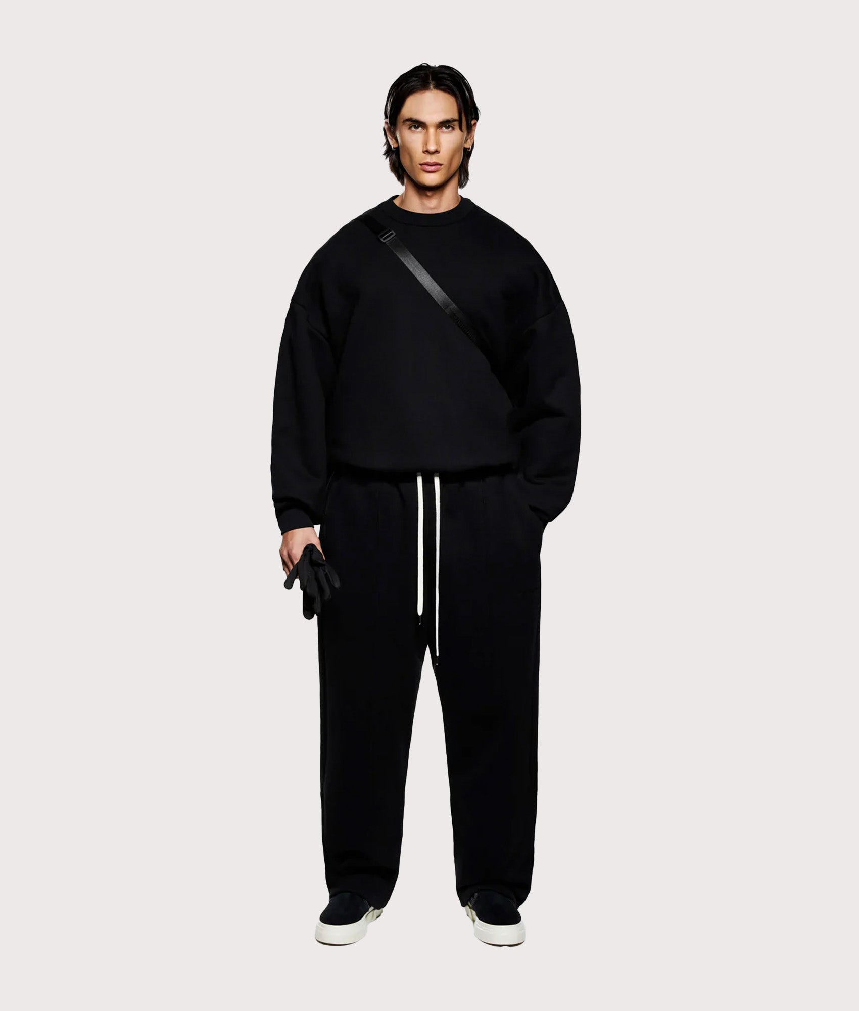 MKI Miyuki Zoku 800 GSM Superweight Crewneck Sweatshirt in Black at EQVVS. Model front shot.