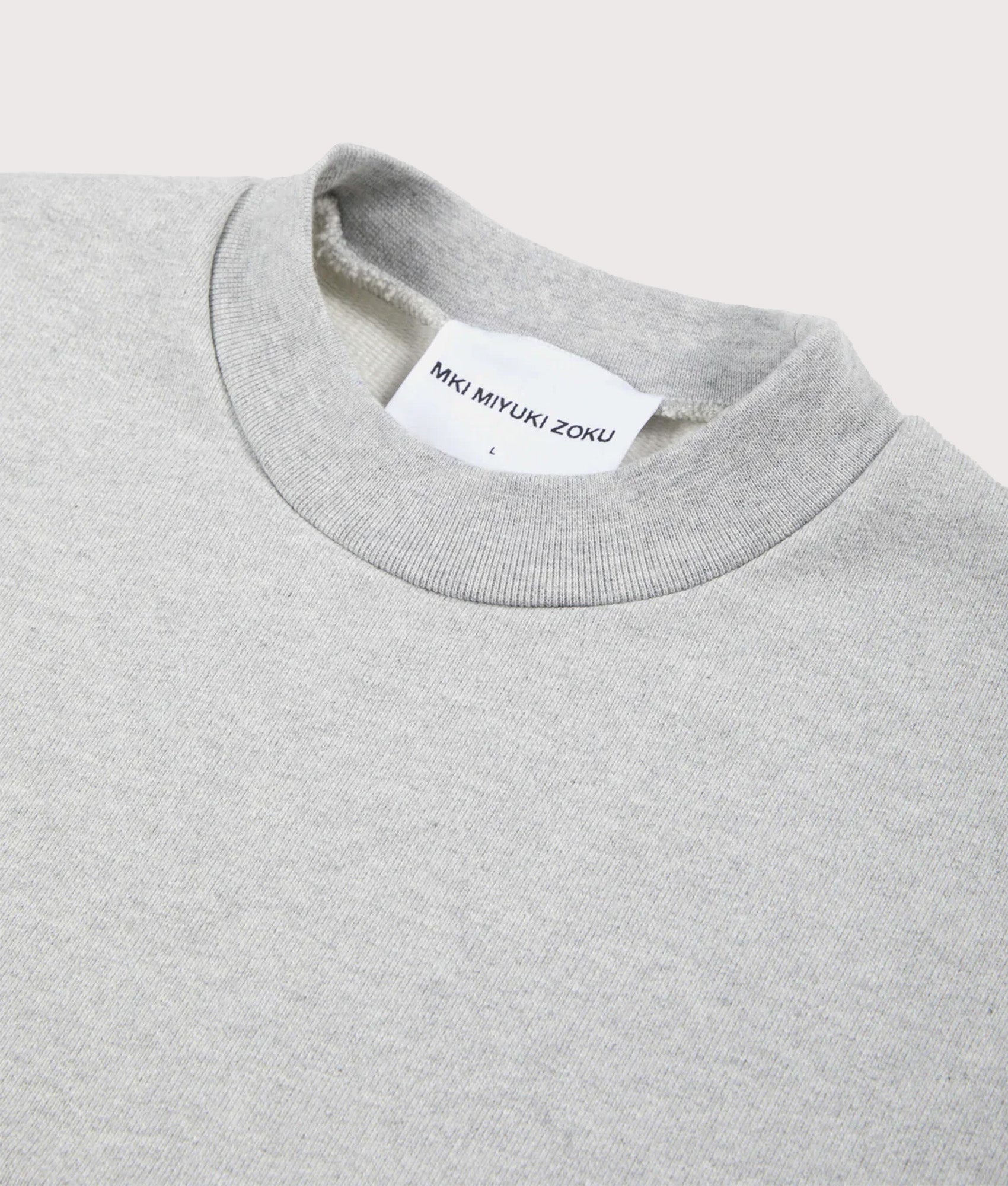 Oversized 800 GSM Superweight Sweatshirt in Grey by MKI MIYUKI ZOKU at EQVVS. Detail shot.