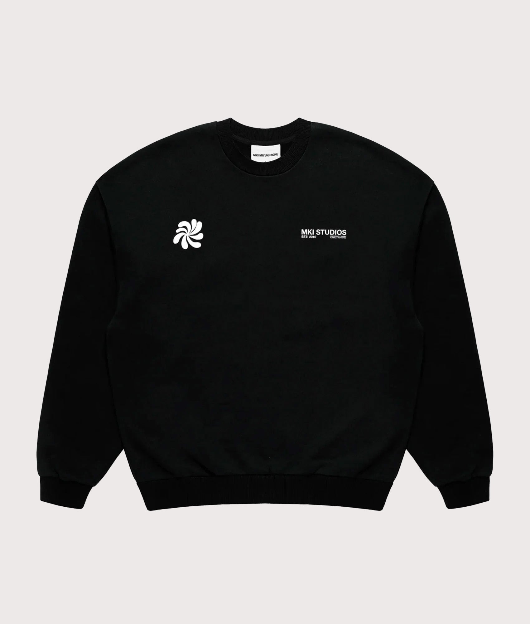 MKI MIYUKI ZOKU Oversized Abstract Crewneck Sweatshirt in Black at EQVVS Menswear. front shot.
