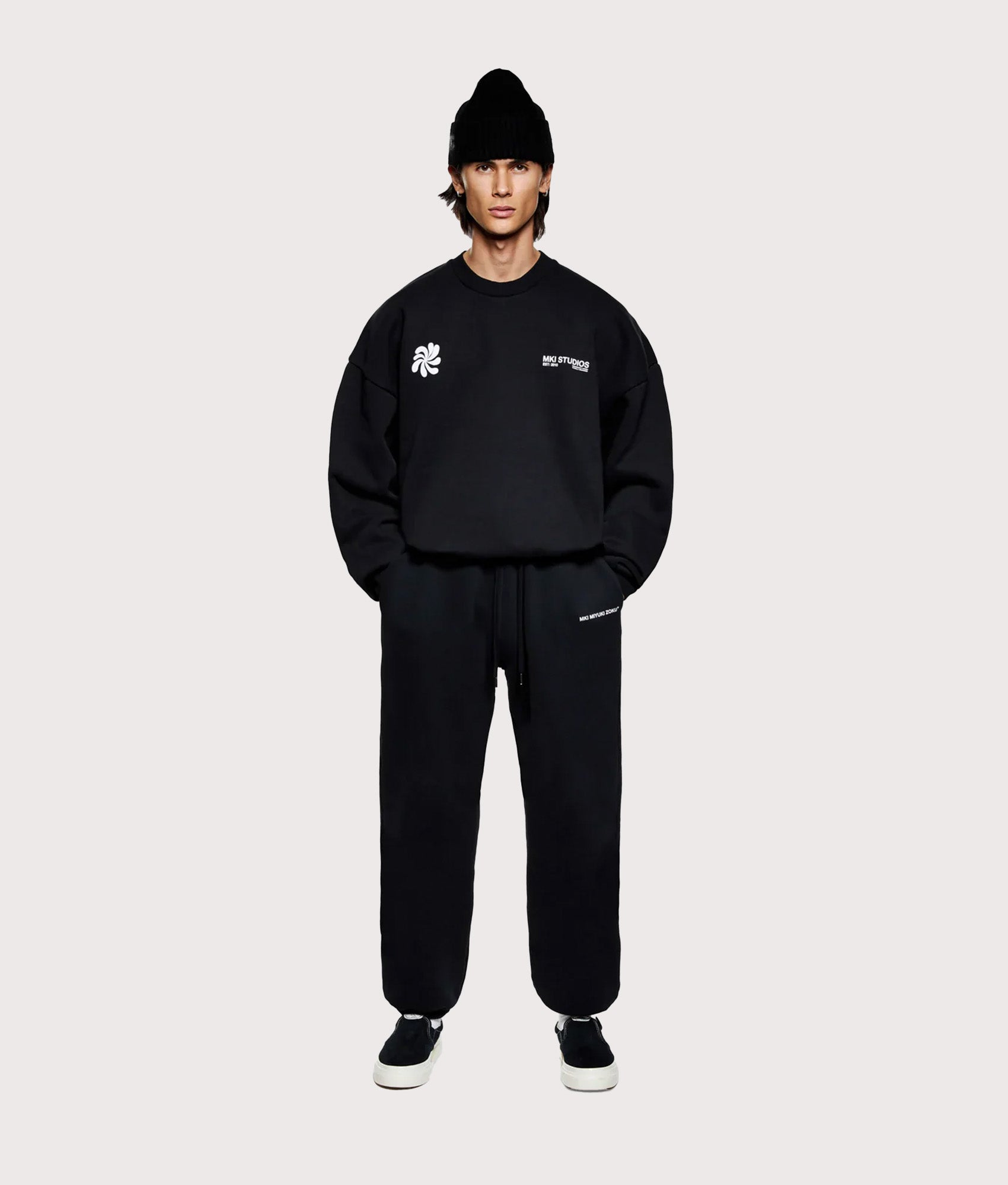 MKI MIYUKI ZOKU Oversized Abstract Crewneck Sweatshirt in Black at EQVVS Menswear. Full model front shot.