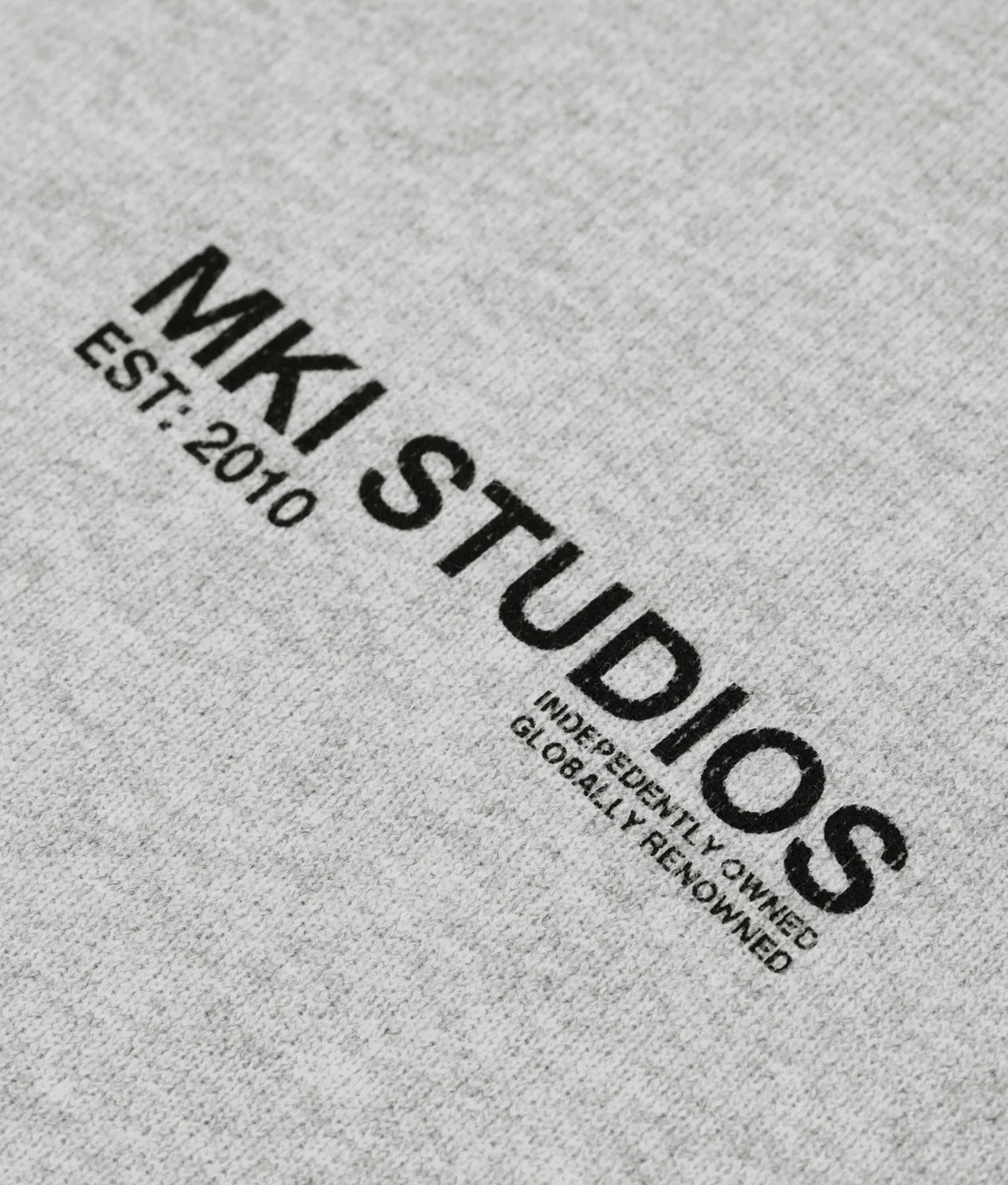 MKI MIYUKI ZOKU Oversized Abstract Hoodie in Grey at EQVVS Menswear. Detail shot.