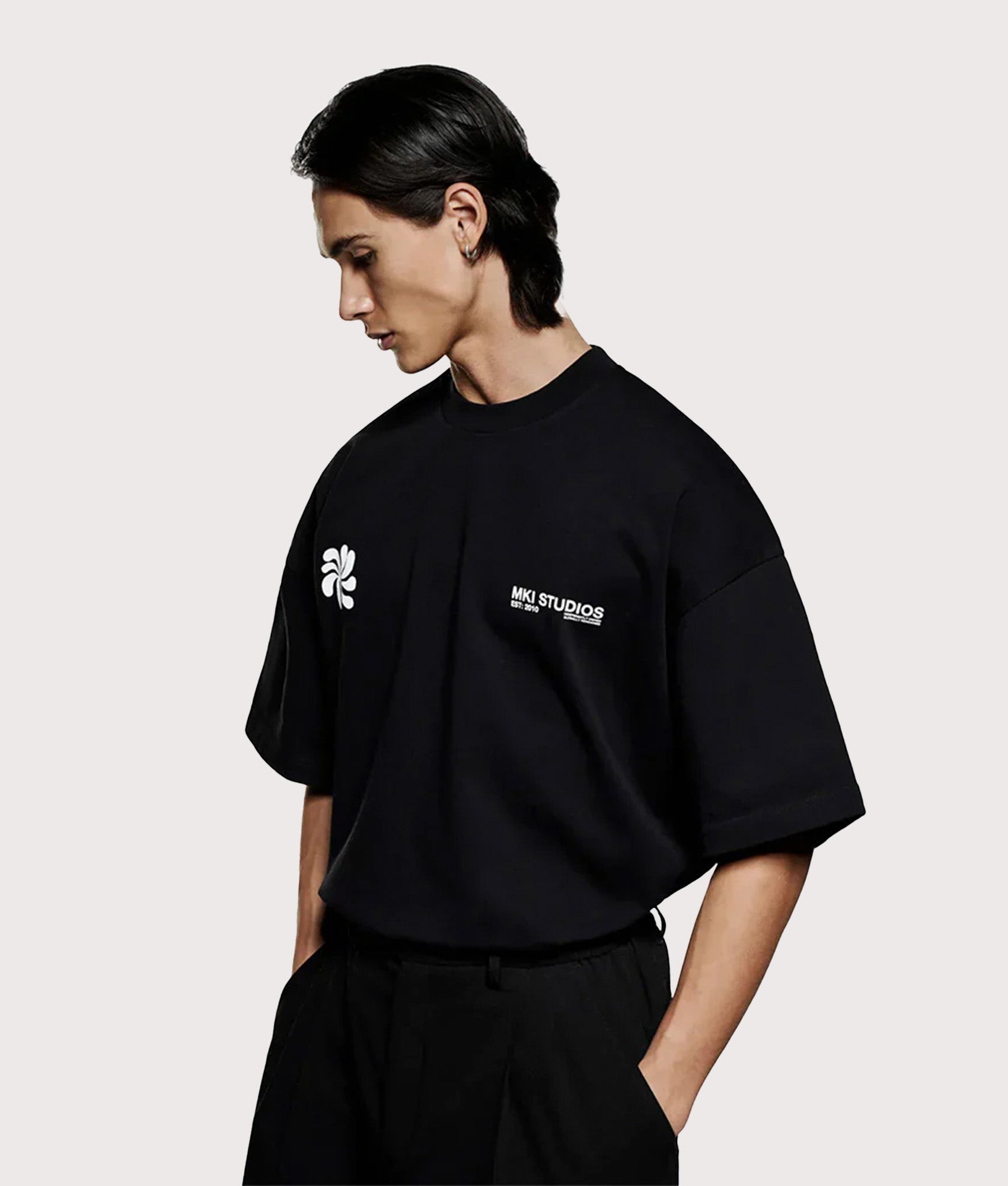 MKI MIYUKI ZOKU Oversized Abstract T-Shirt in Black at EQVVS Menswear. Front shot.