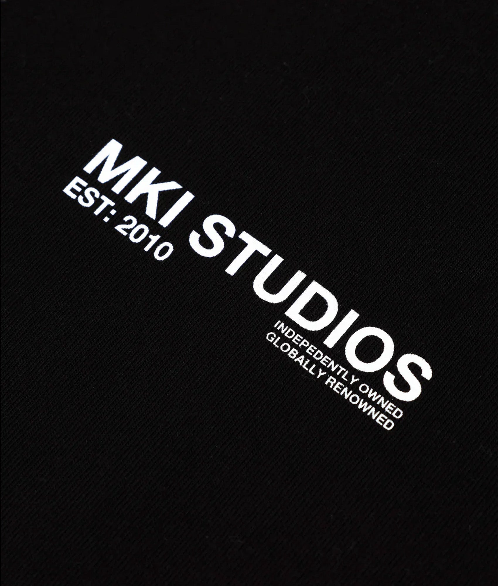 MKI MIYUKI ZOKU Oversized Abstract T-Shirt in Black at EQVVS Menswear. Detail shot.