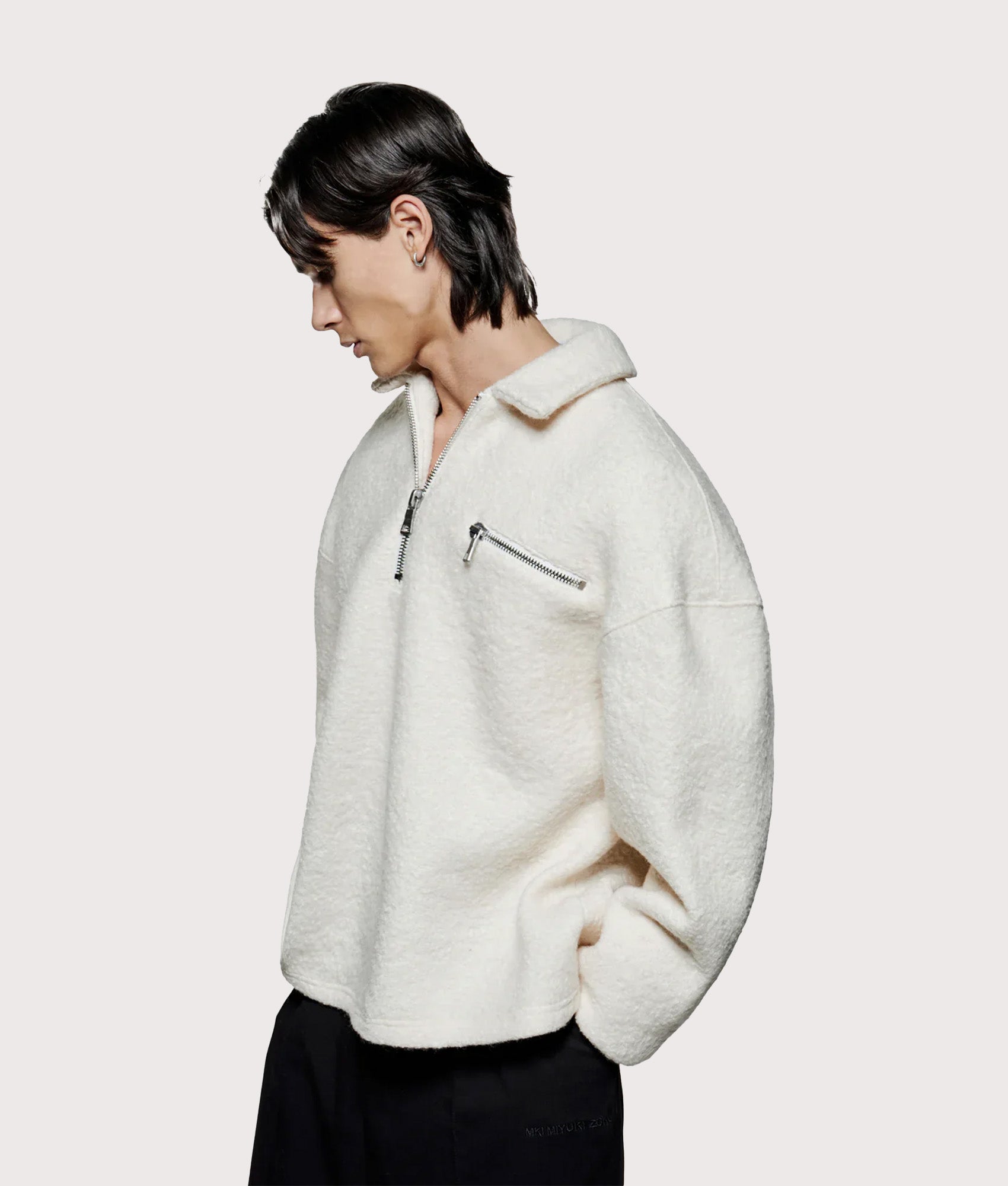 MKI MIYUKI ZOKU Oversized Fit Boucle Quarter Zip Overshirt in Off White at EQVVS Menswear. Angled model front shot.