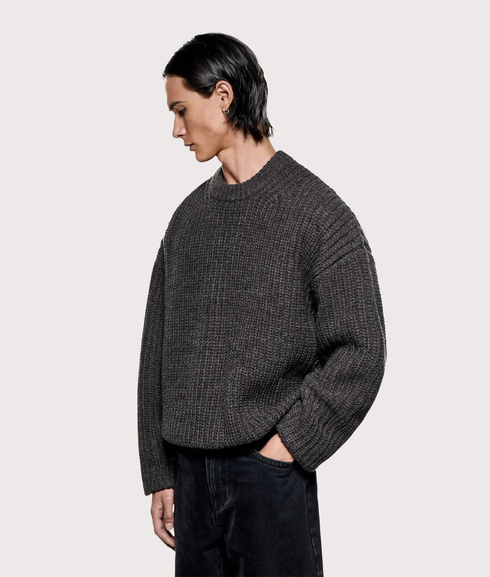 MKI MIYUKI ZOKU Oversized Chunky Rib Knit Crewneck Jumper in Charcoal melange at EQVVS Menswear. Angled model front shot.