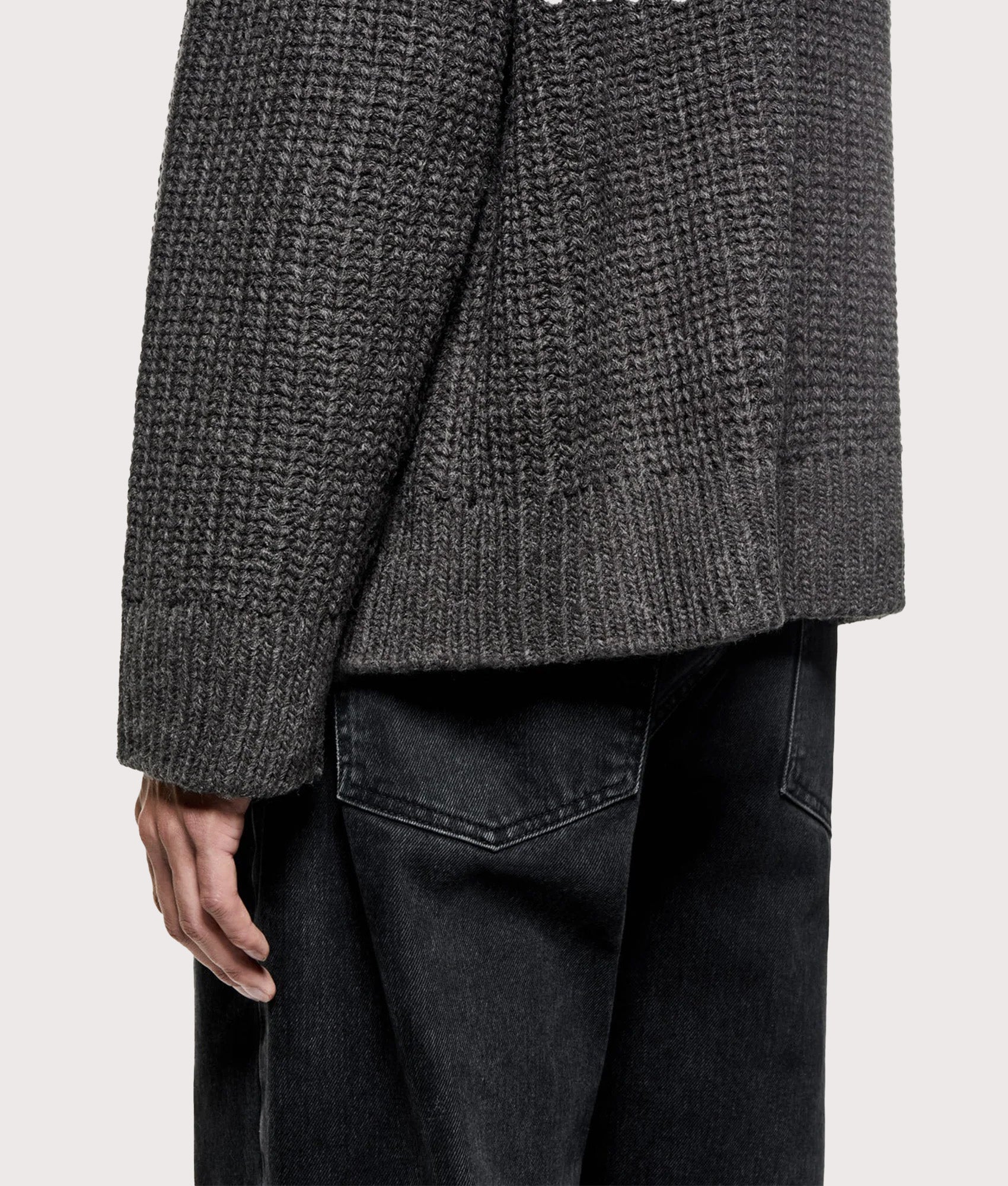 MKI MIYUKI ZOKU Oversized Chunky Rib Knit Crewneck Jumper in Charcoal melange at EQVVS Menswear. Model shot.