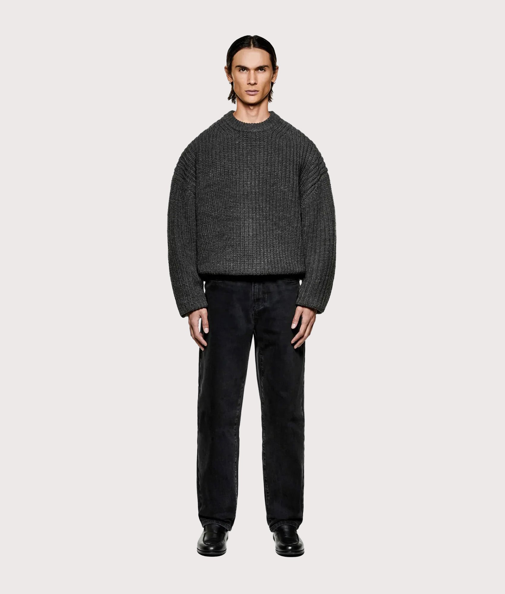 MKI MIYUKI ZOKU Oversized Chunky Rib Knit Crewneck Jumper in Charcoal melange at EQVVS Menswear. Model full front shot.