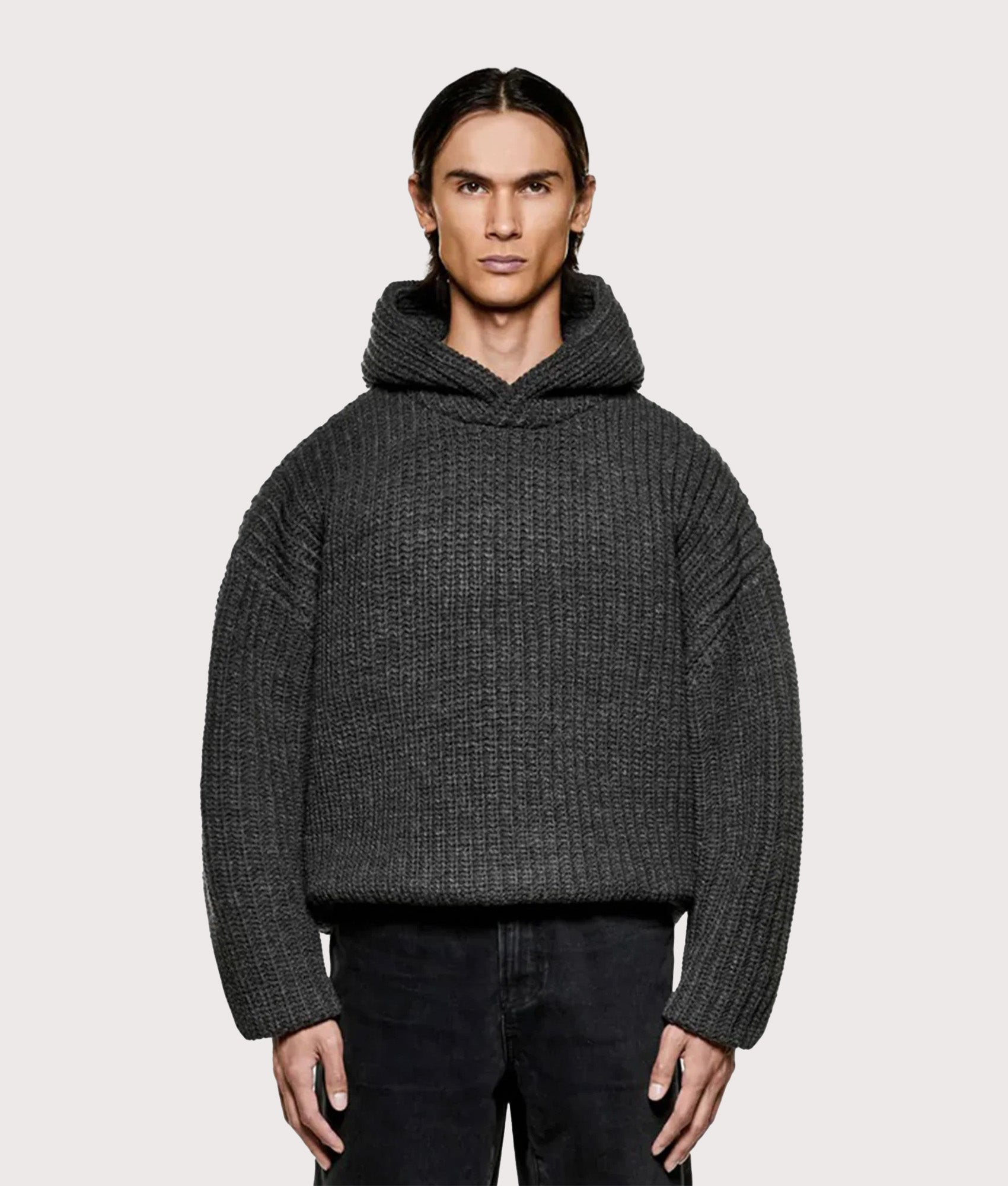 MKI MIYUKI ZOKU Oversized Chunky Rib Knit Hoodie in Charcoal Melange at EQVVS Menswear. Model front shot.