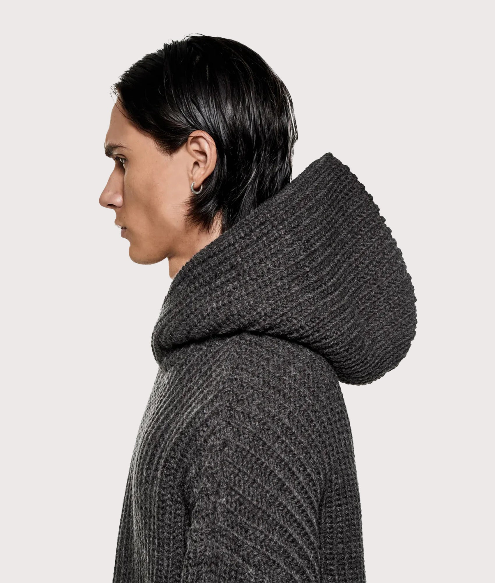 MKI MIYUKI ZOKU Oversized Chunky Rib Knit Hoodie in Charcoal Melange at EQVVS Menswear. Model side shot.