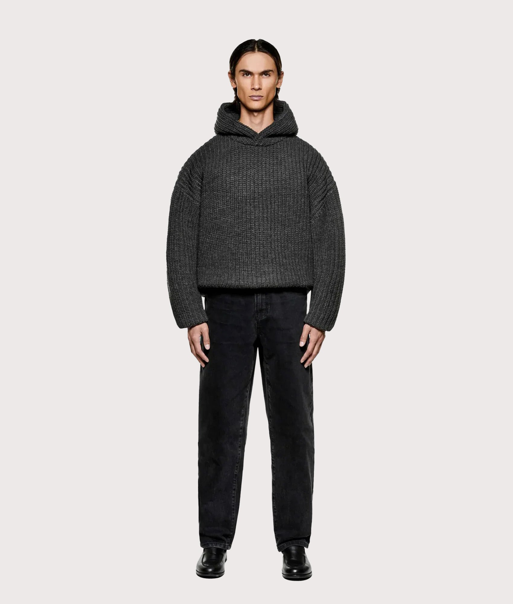 MKI MIYUKI ZOKU Oversized Chunky Rib Knit Hoodie in Charcoal Melange at EQVVS Menswear. Model full front shot.