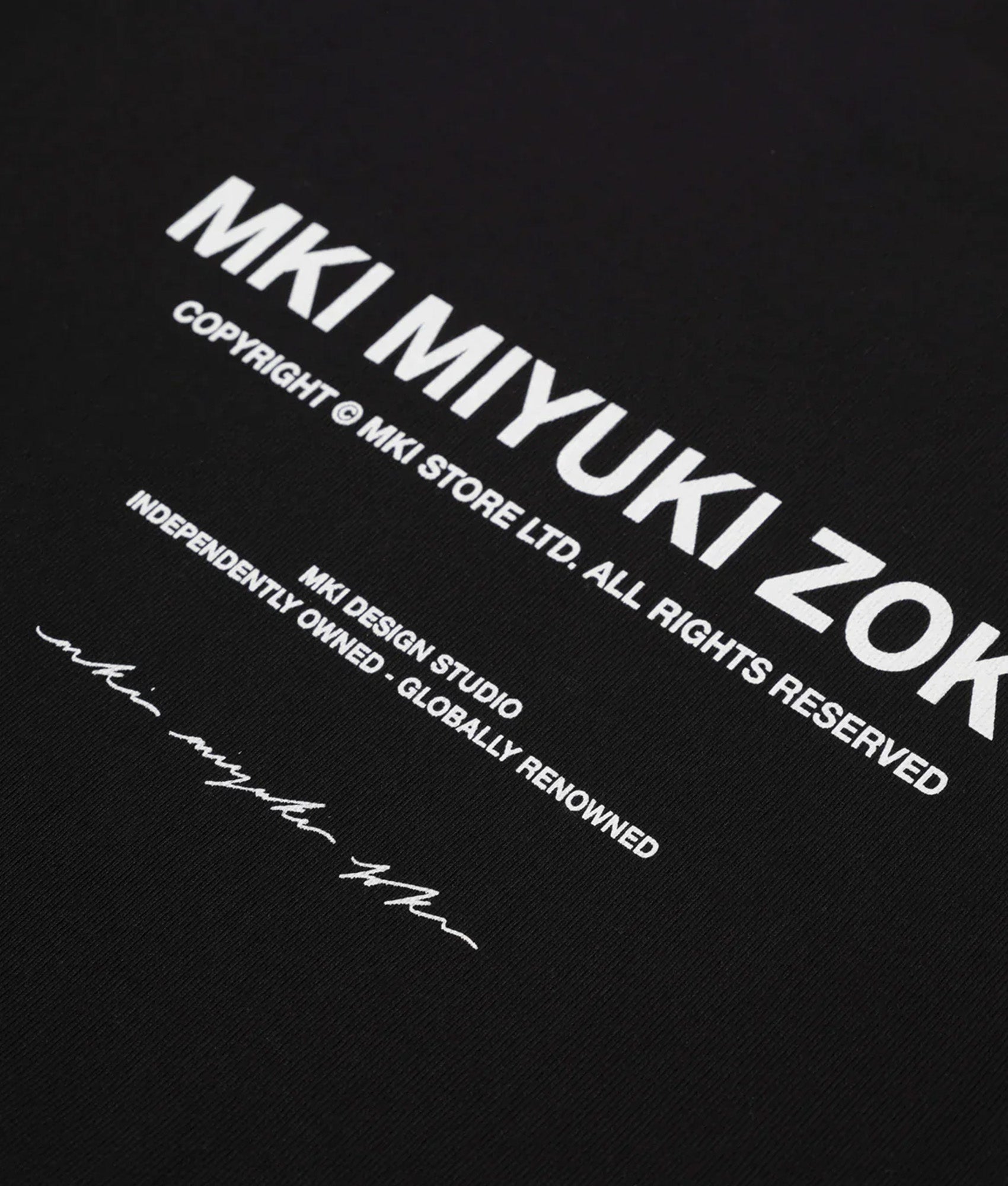 MKI MIYUKI ZOKU Oversized studio sweatshirt in Black at EQVVS Menswear. Detail shot.
