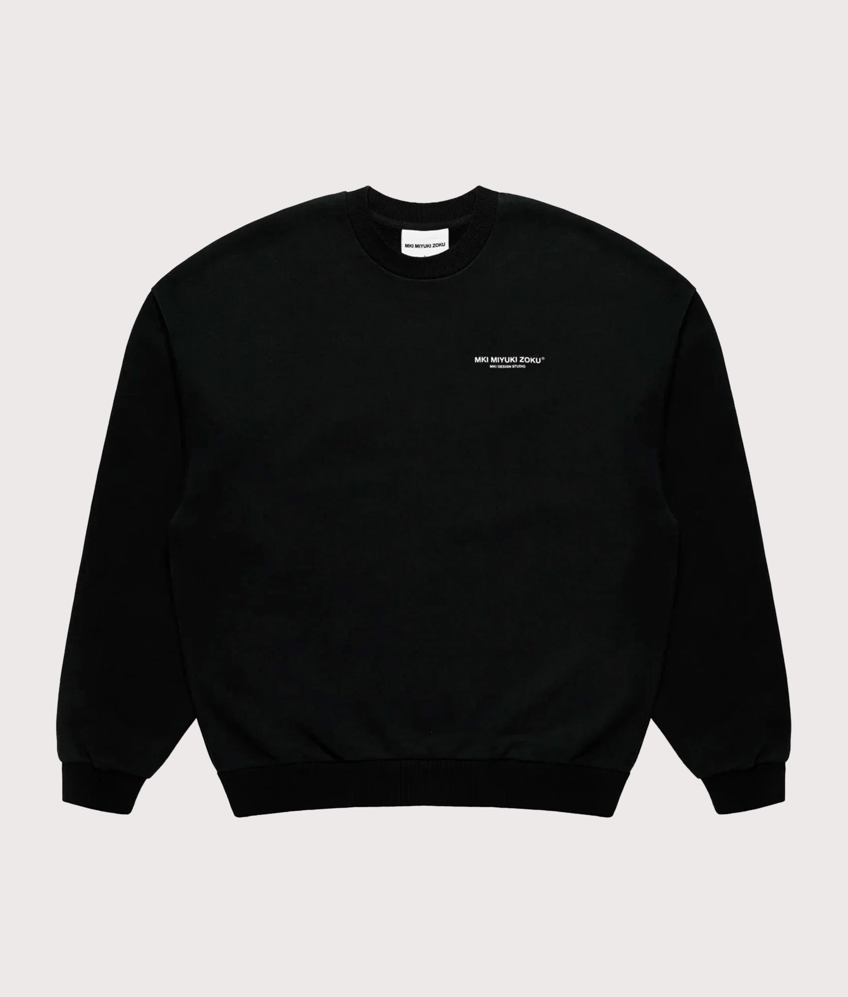 MKI MIYUKI ZOKU Oversized studio sweatshirt in Black at EQVVS Menswear. Front shot.