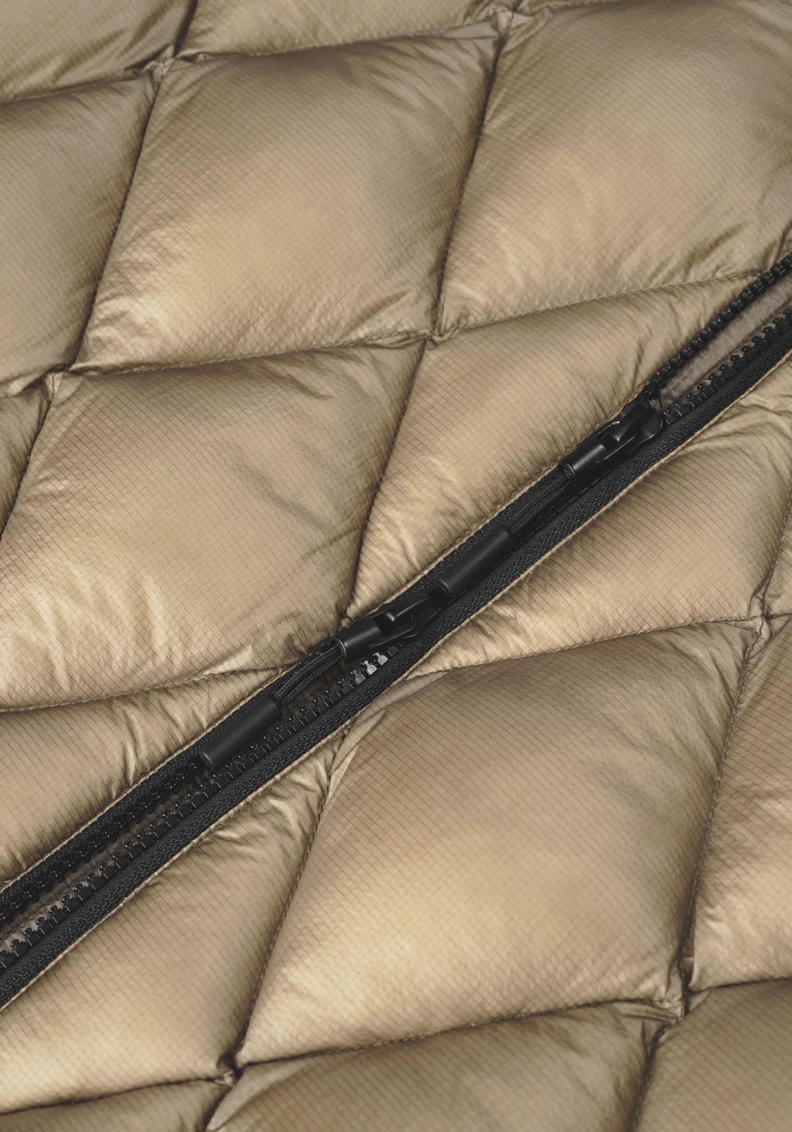 MKI Diamond Quilted Bubble Jacket. Khaki.  Detail shot. 
