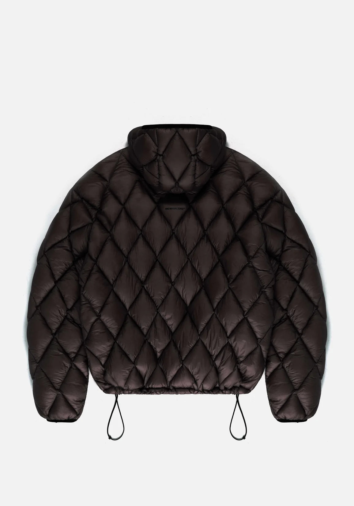Diamond Bubble Jacket in black by MKI Miyuki Zoku. Flat shot. 
