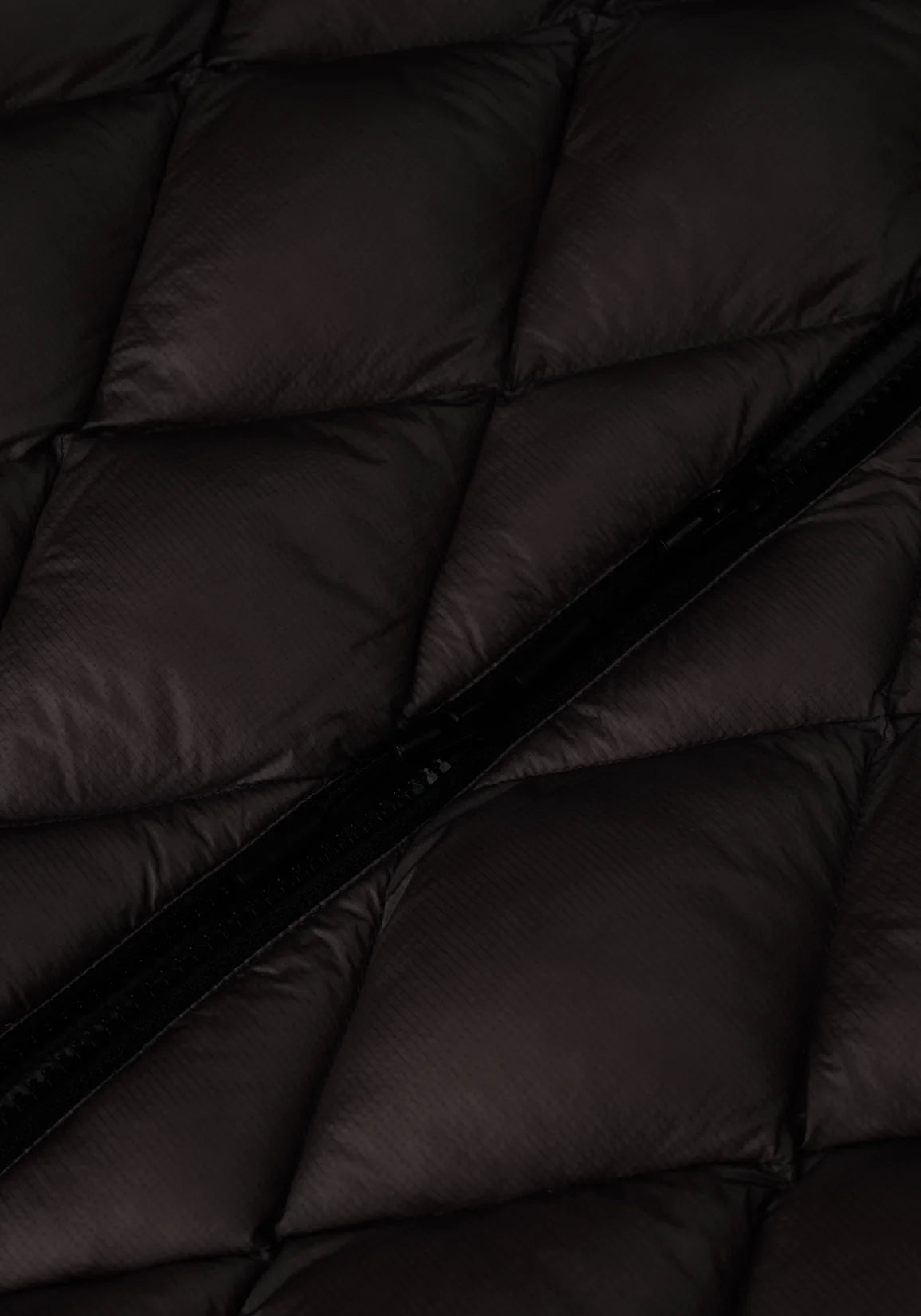 Diamond Bubble Jacket in black by MKI Miyuki Zoku. Detail shot. 