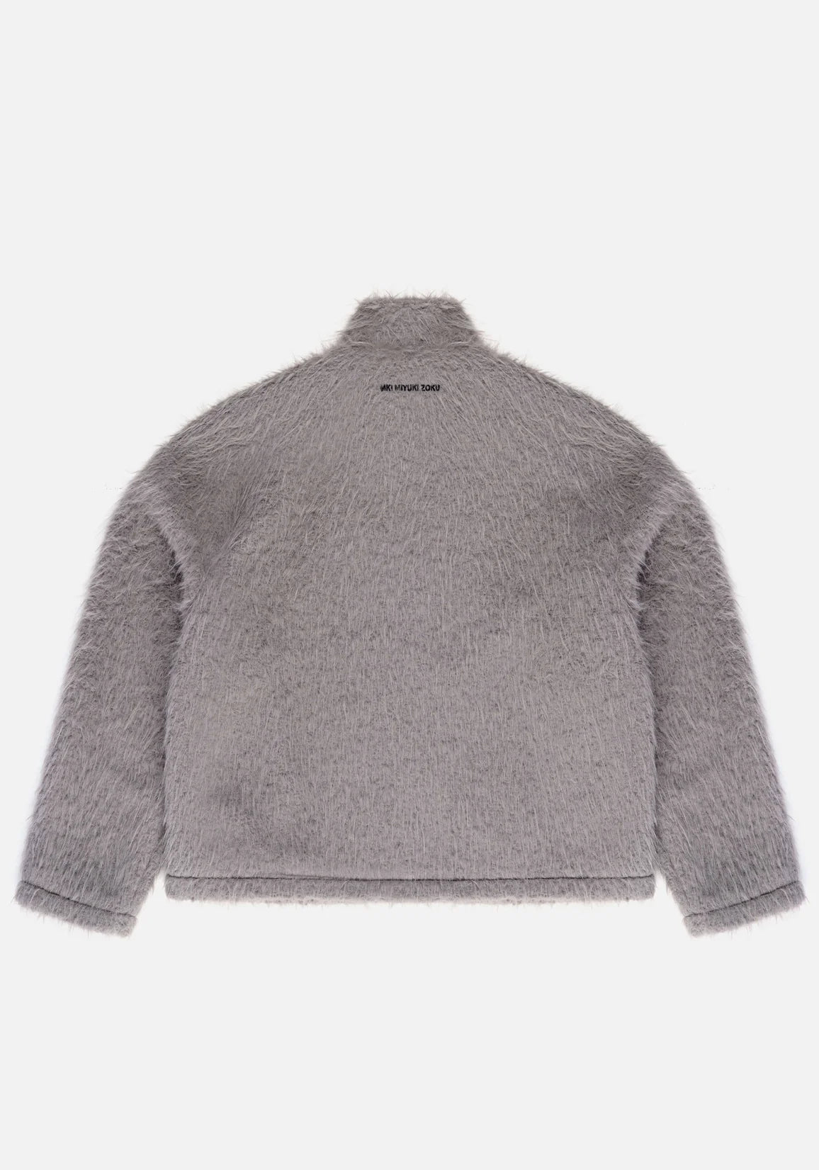 MKI Miyuki Zoku Faux Alpaca Track Jacket Light Grey. Flat shot. 
