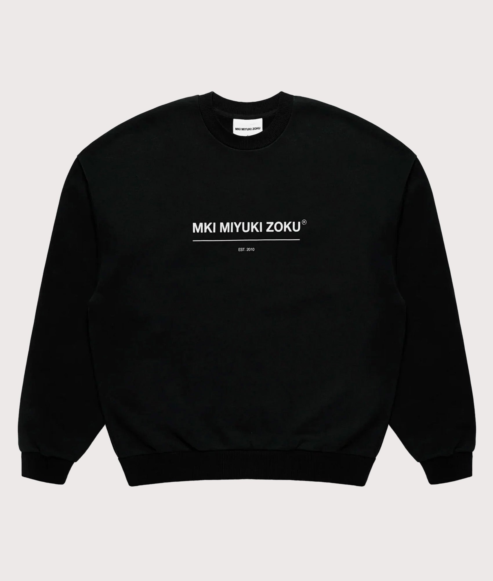 MKI MIYUKI ZOKU Oversized Linear Crewneck Sweatshirt in Black at EQVVS Menswear. Front shot.