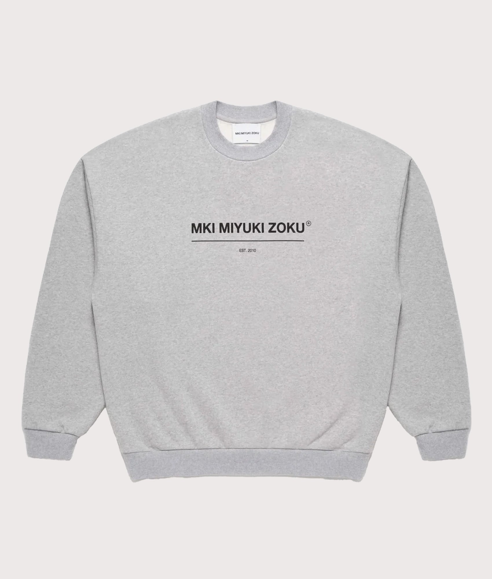 MKI MIYUKI ZOKU Oversized Linear Crewneck Sweatshirt in Grey at EQVVS Menswear. Front shot.
