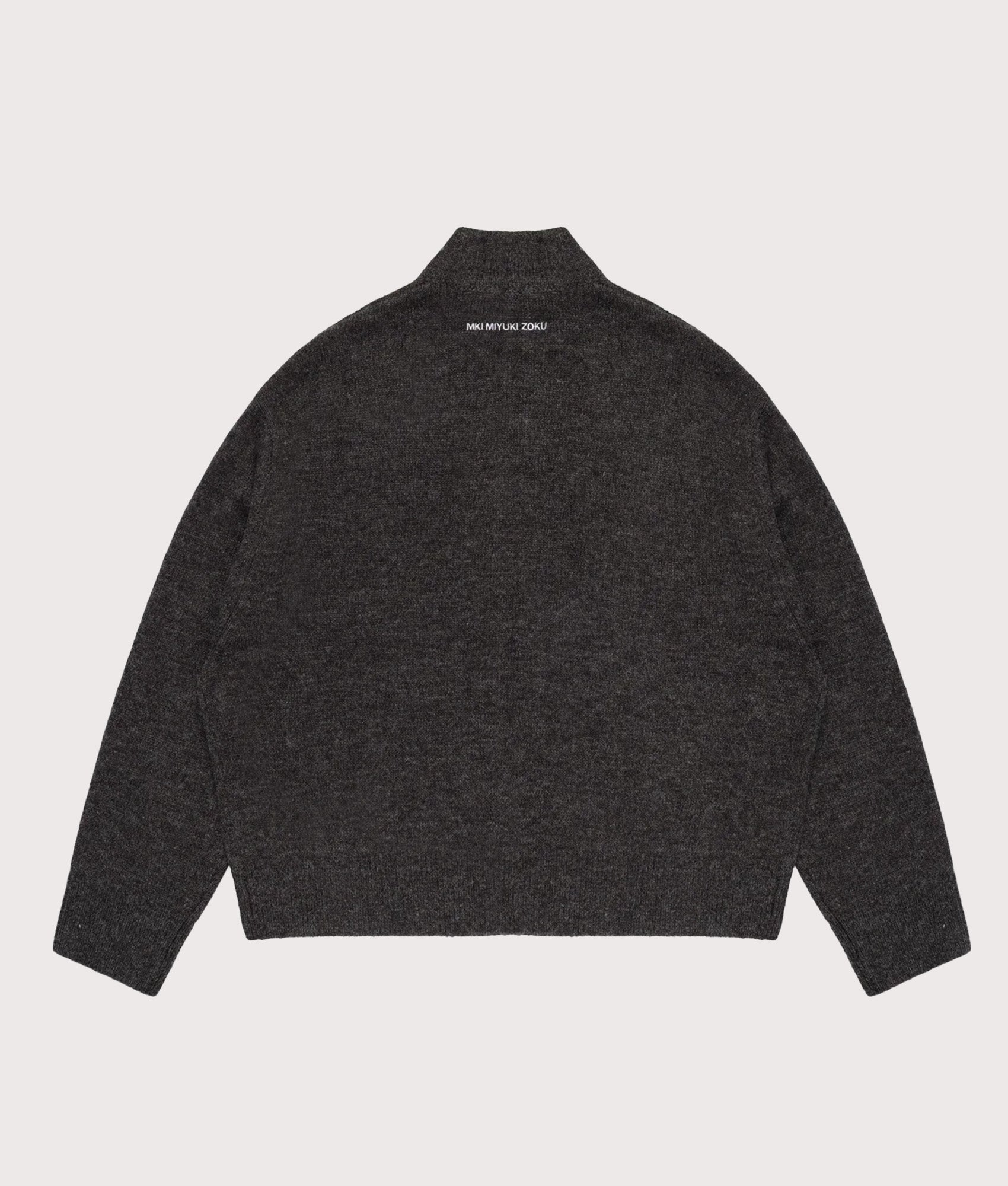 MKI MIYUKI ZOKU Oversized Fit Mohair Blend Knit Track Jacket in Charcoal at EQVVS Menswear. Back shot.