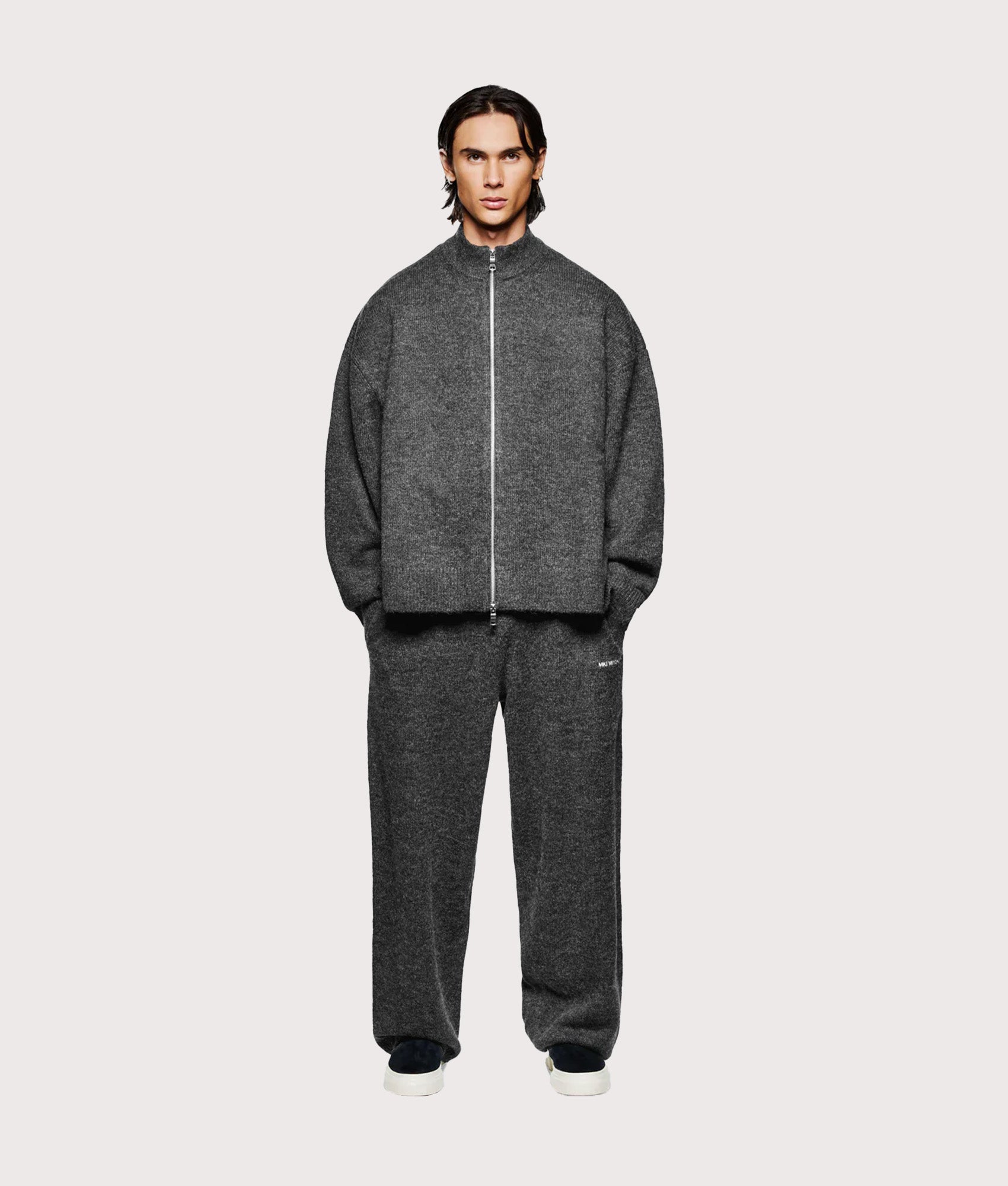 MKI MIYUKI ZOKU Oversized Fit Mohair Blend Knit Track Jacket in Charcoal at EQVVS Menswear. Model full front shot.