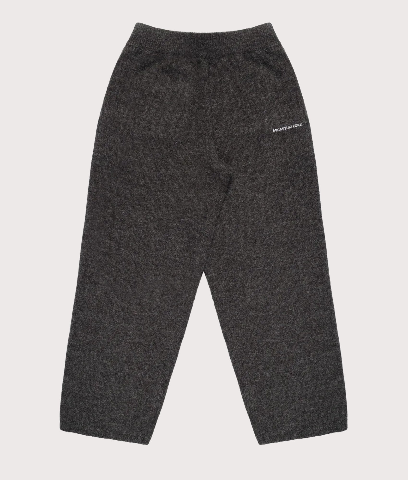 MKI MIYUKI ZOKU Relaxed Fit Mohair Blend Knit Wide Leg Joggers in Charcoal at EQVVS Menswear. Front shot.
