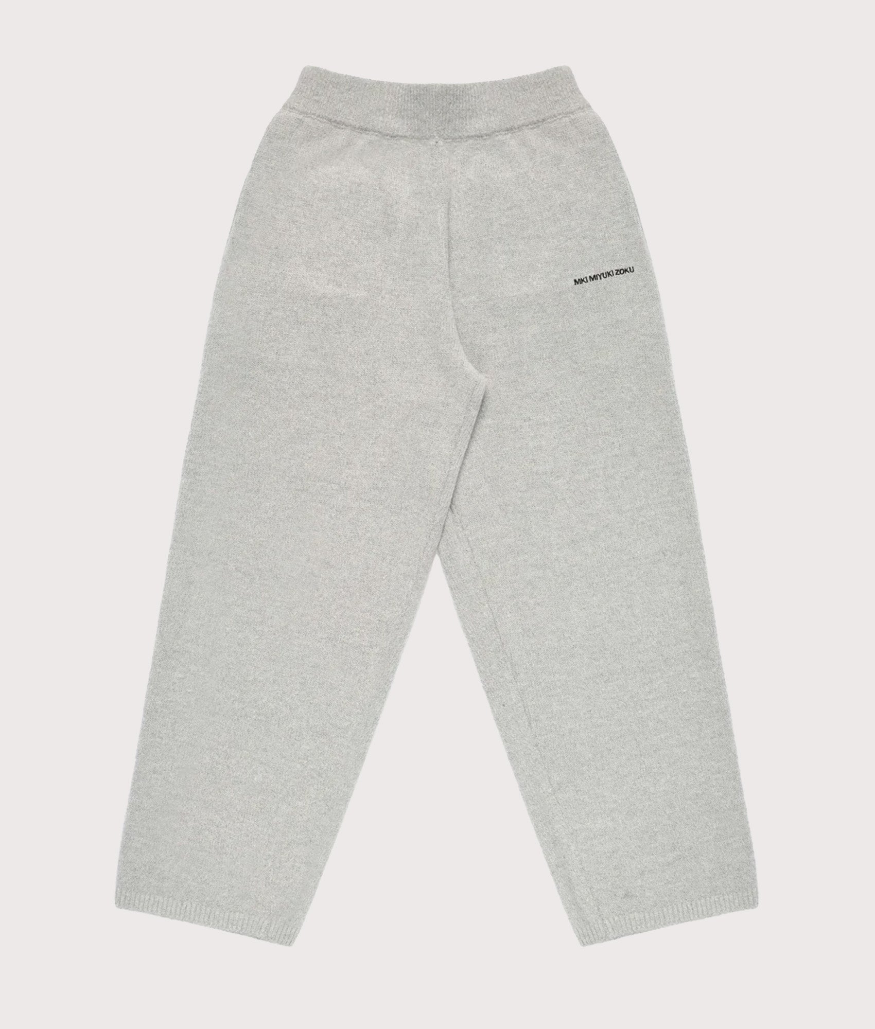 MKI MIYUKI ZOKU Relaxed Fit Mohair Blend Knit Wide Leg Joggers in Light Grey at EQVVS Menswear. Front shot.