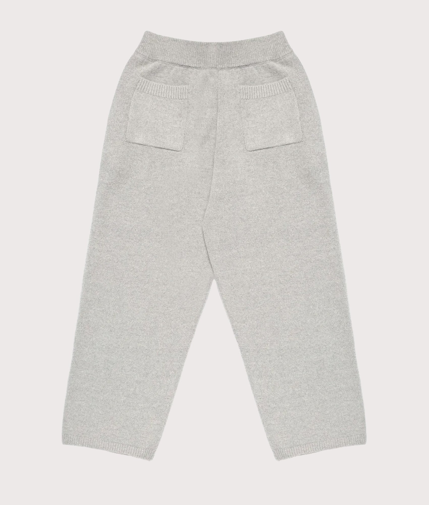MKI MIYUKI ZOKU Relaxed Fit Mohair Blend Knit Wide Leg Joggers in Light Grey at EQVVS Menswear. Back shot.