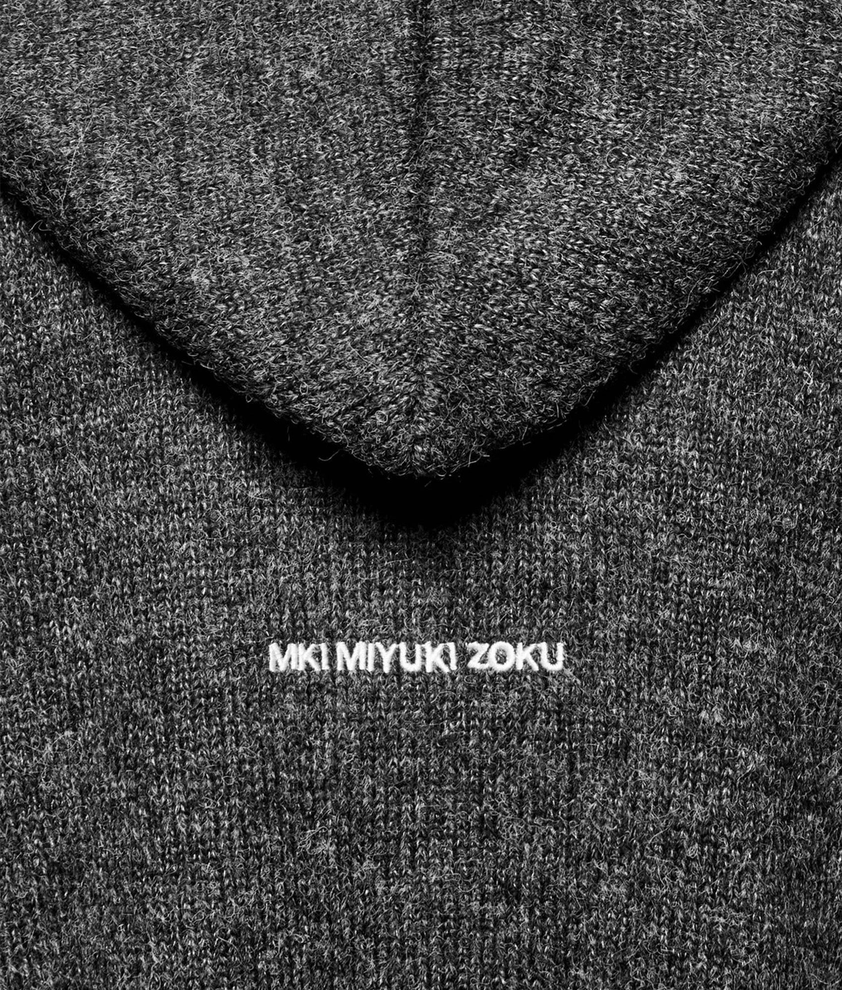 MKI MIYUKI ZOKU Mohair Blend Knit Zip Through Hoodie in Charcoal at EQVVS Menswear. Detail shot.