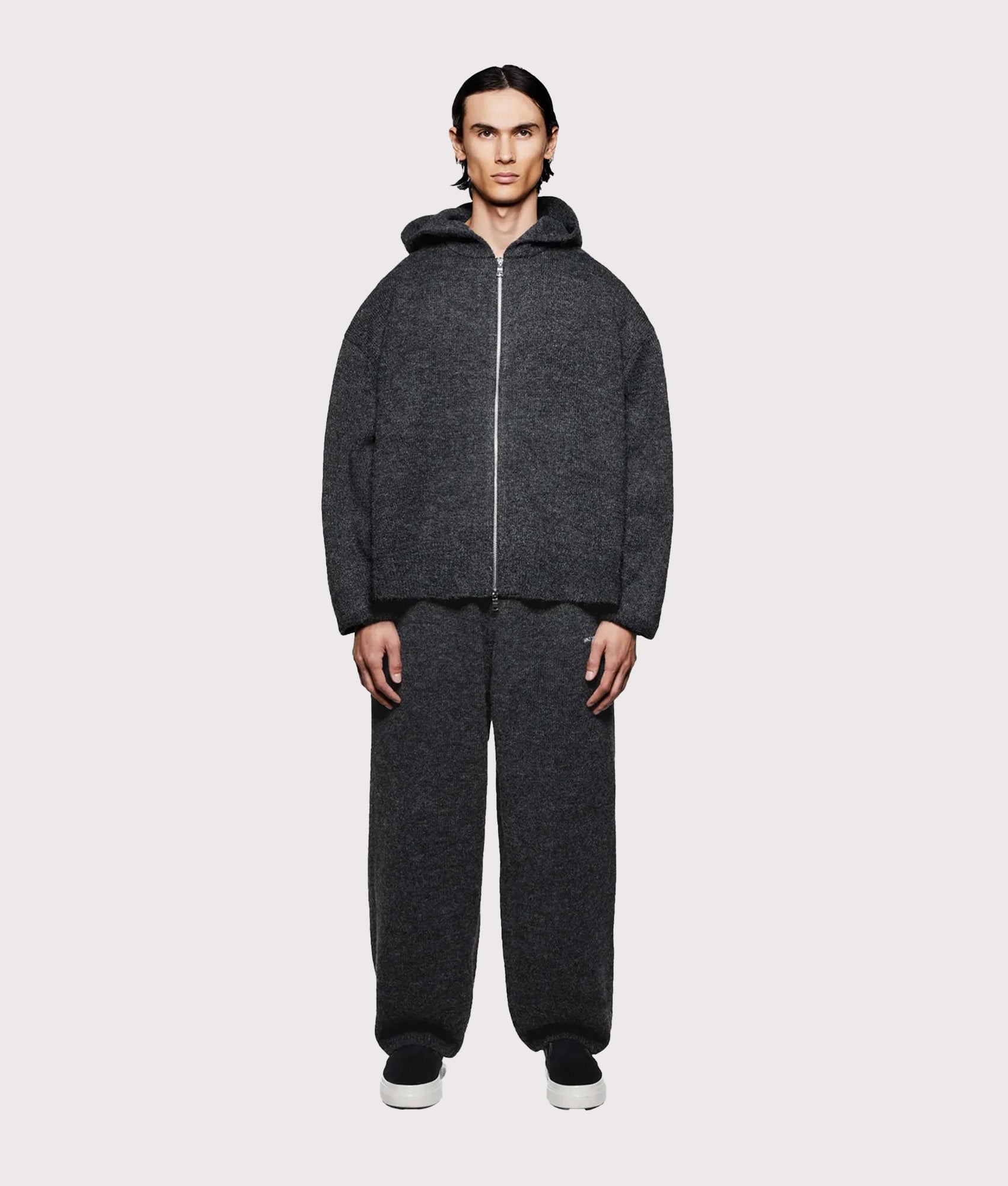 MKI MIYUKI ZOKU Mohair Blend Knit Zip Through Hoodie in Charcoal at EQVVS Menswear. Model full front shot.