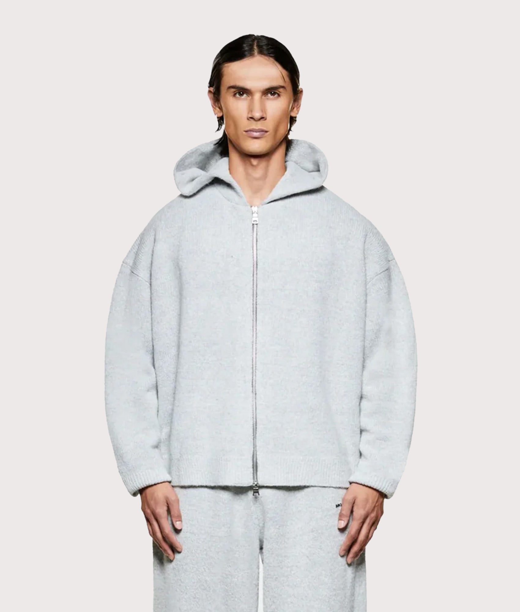 MKI MIYUKI ZOKU Mohair Blend Knit Zip Through Hoodie in Light Grey at EQVVS Menswear. Front shot.