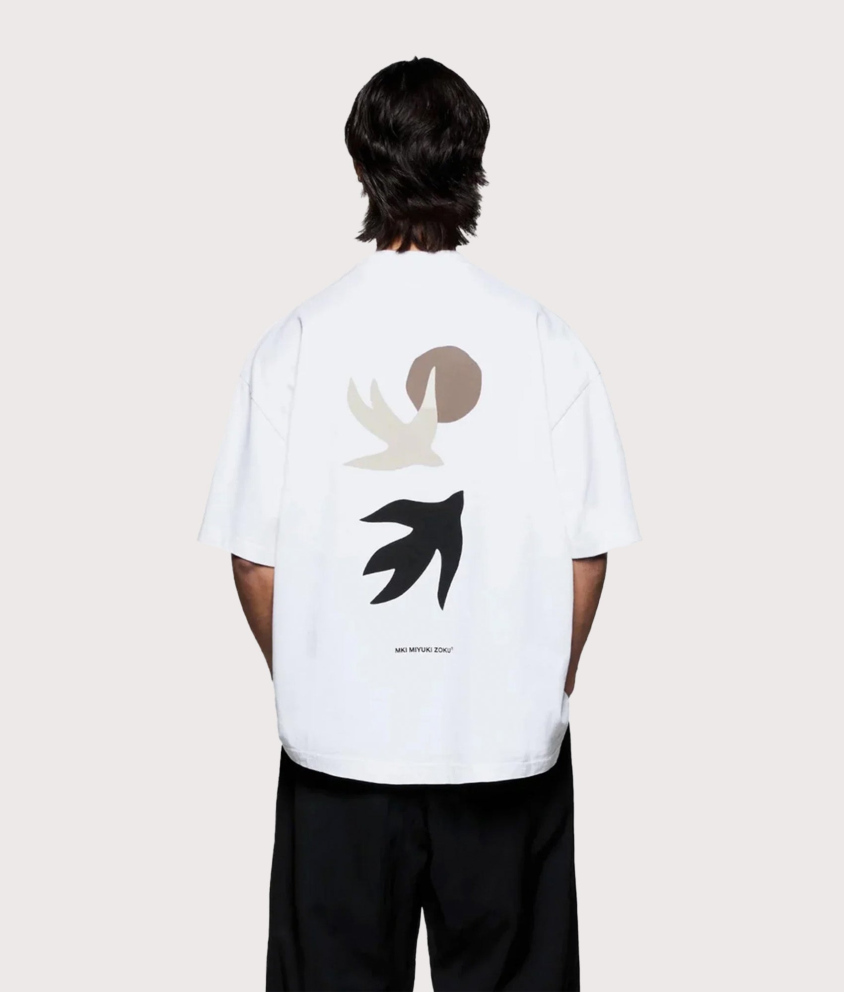 MKI MIYUKI ZOKU Oversized Swallow T-Shirt in White at EQVVS Menswear. Back shot.