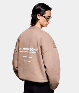 Design Studio Crewneck Sweatshirt. Shot by EQVVS. Back angled model shot.