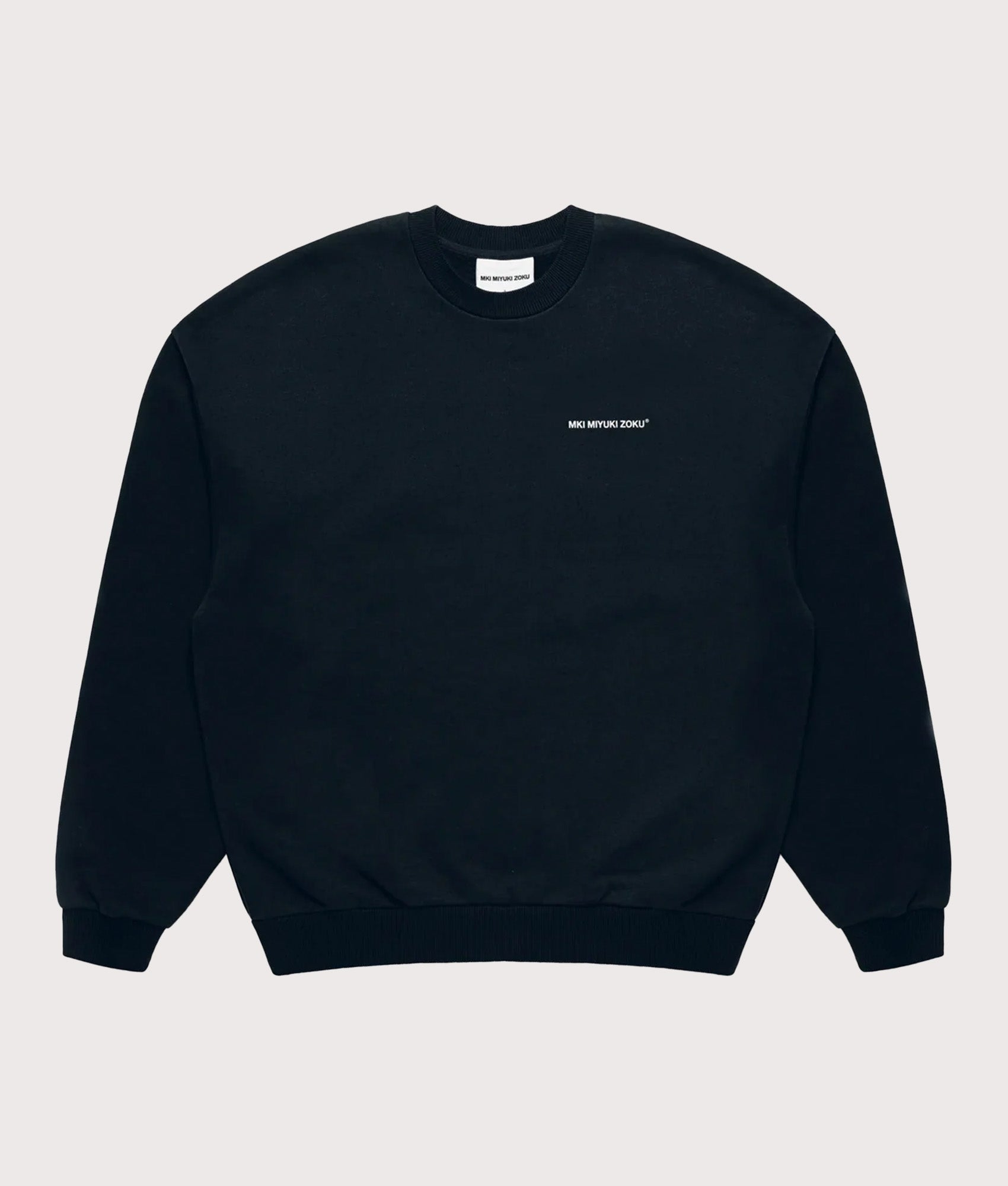 MKI MIYUKI ZOKU Oversized Uniform Crew Sweatshirt in Navy at EQVVS Menswear. Front shot.