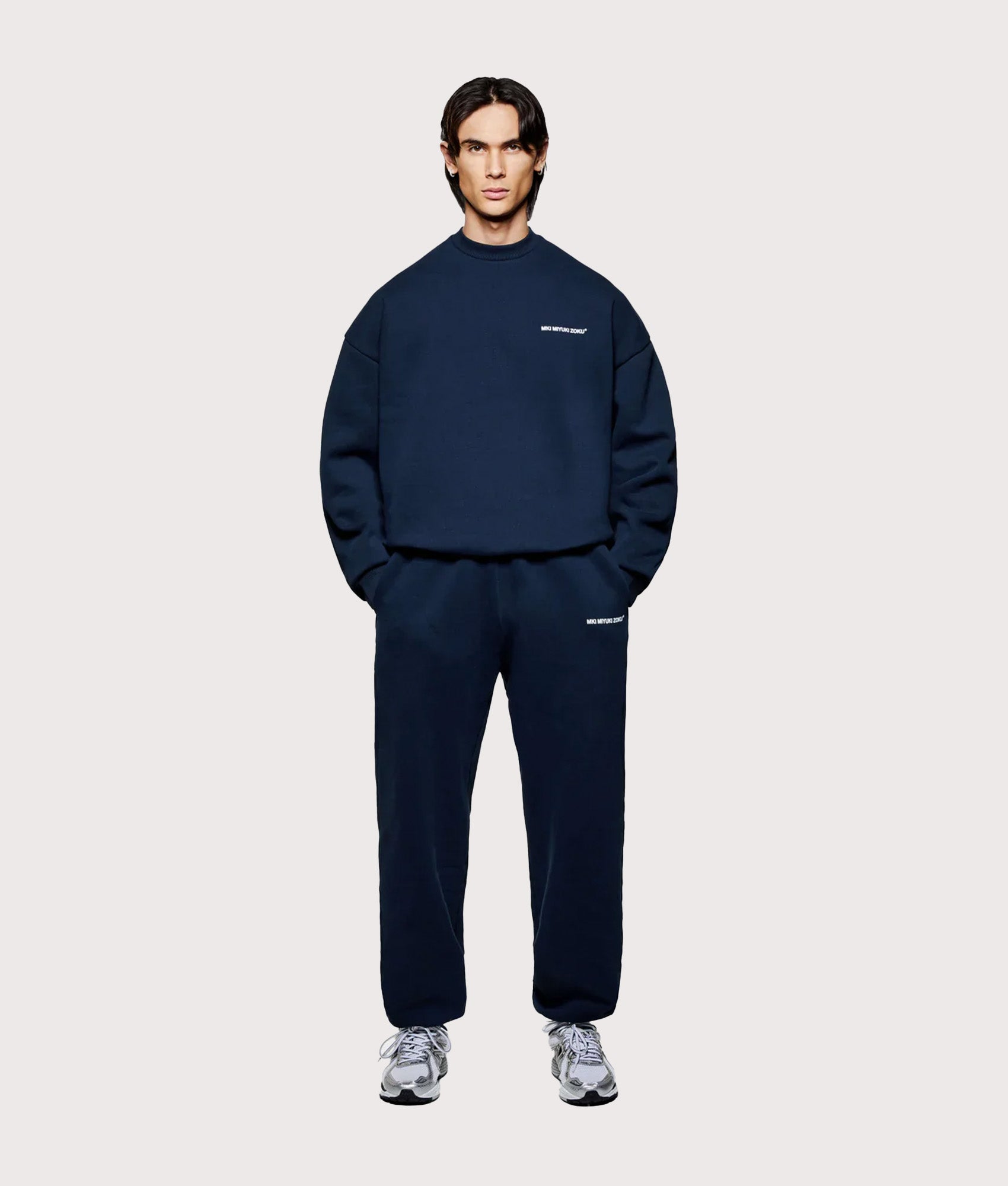 MKI MIYUKI ZOKU Oversized Uniform Crew Sweatshirt in Navy at EQVVS Menswear. Model full front shot.