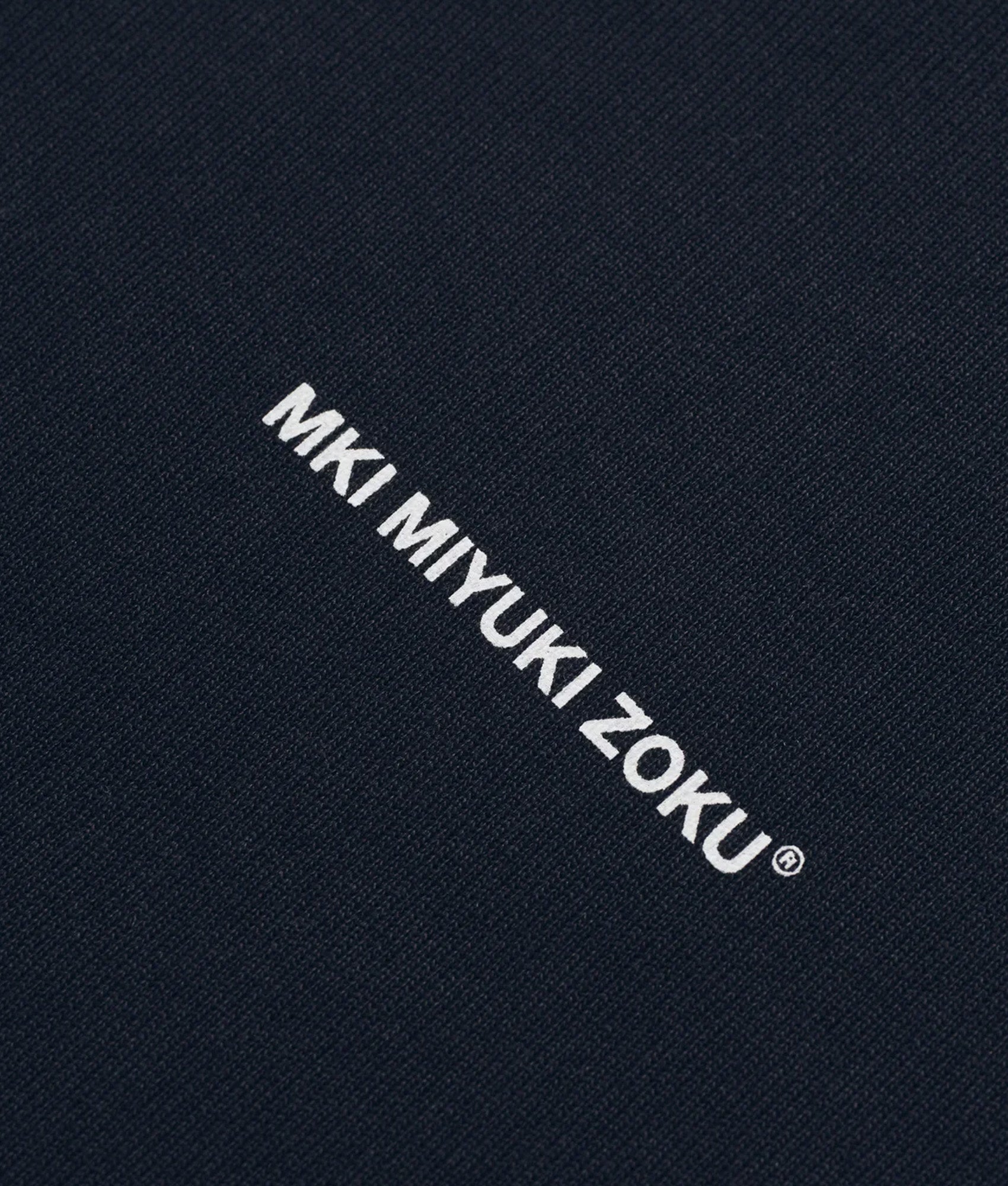 MKI MIYUKI ZOKU Oversized Uniform Crew Sweatshirt in Navy at EQVVS Menswear. Detail shot.
