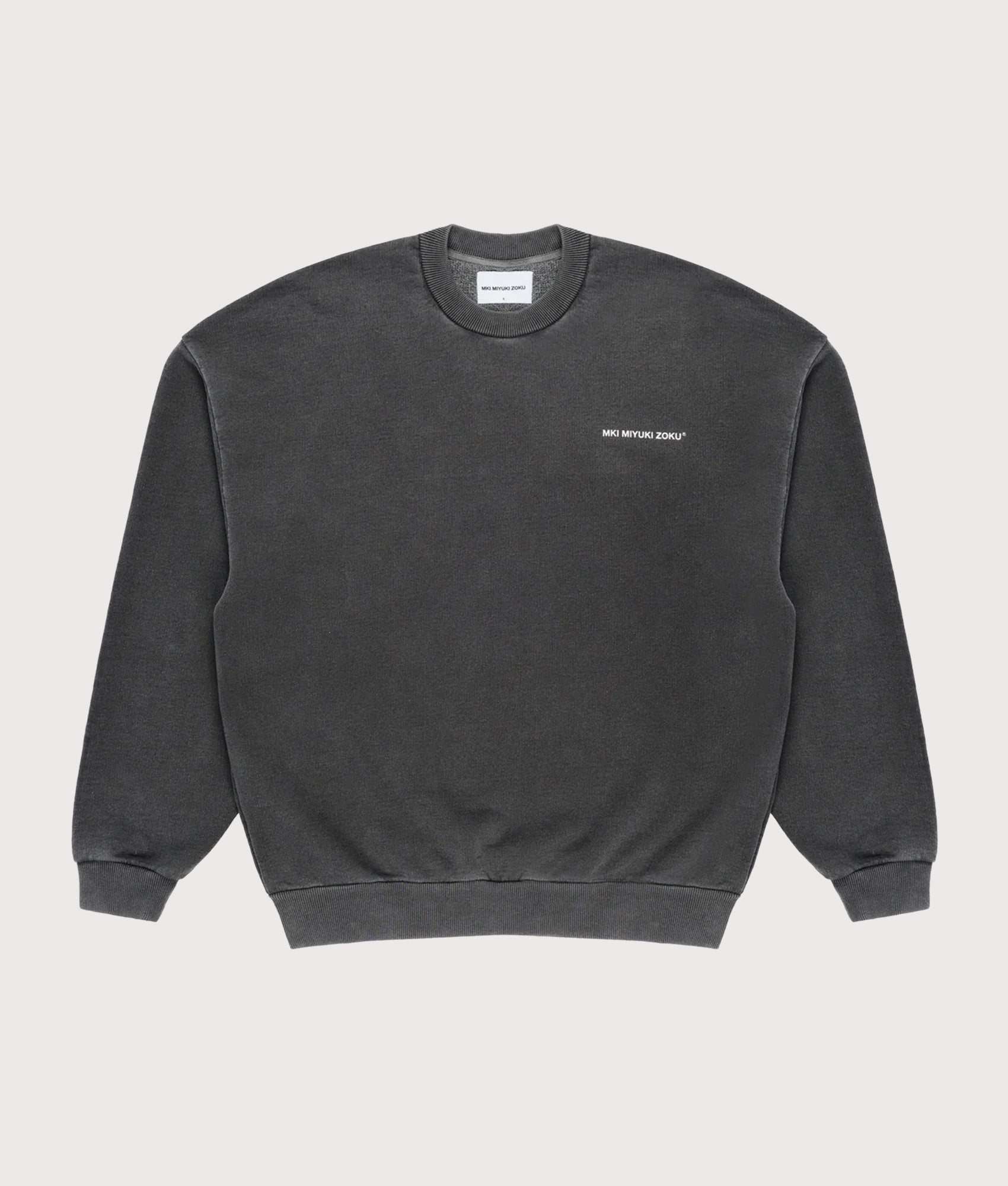 MKI Miyuki Zoku oversized Uniform Crew Sweatshirt in Pigment Black at EQVVS Menswear. Front shot.