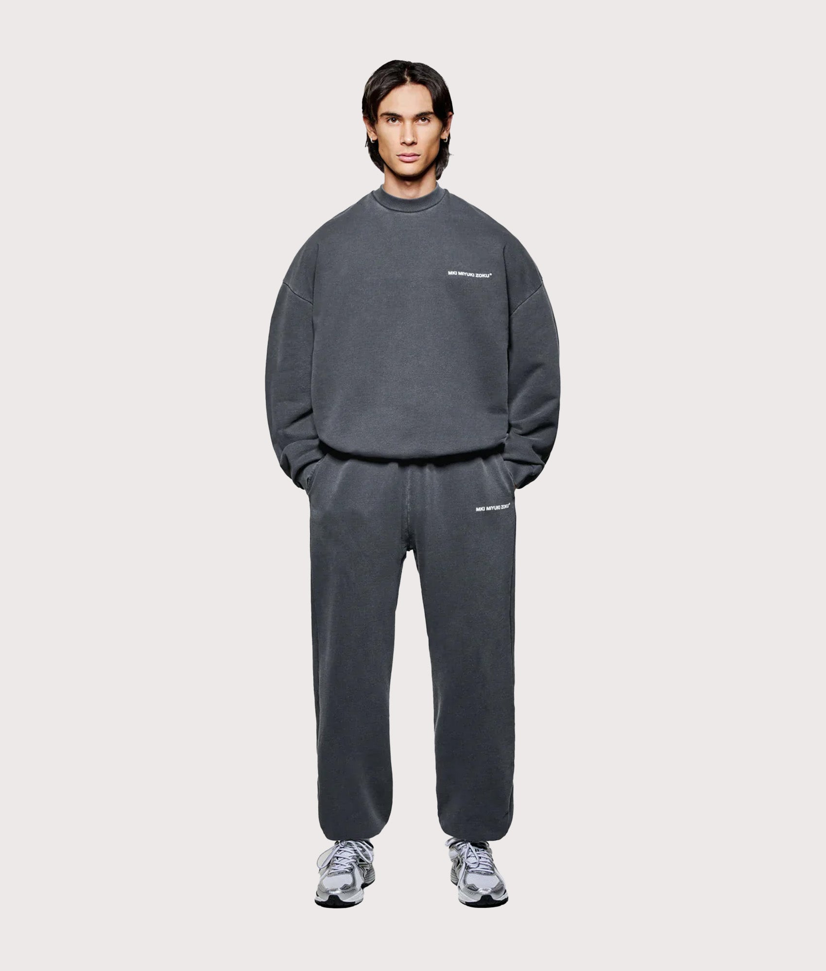 MKI Miyuki Zoku oversized Uniform Crew Sweatshirt in Pigment Black at EQVVS Menswear. Model full front shot.