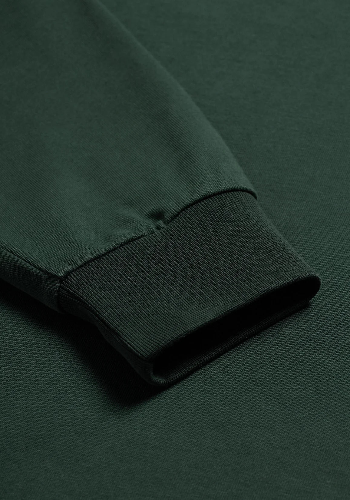 MKI Miyuki Zoku Long Sleeve Uniform T-Shirt in Green. Shot at EQVVS. Detail shot.