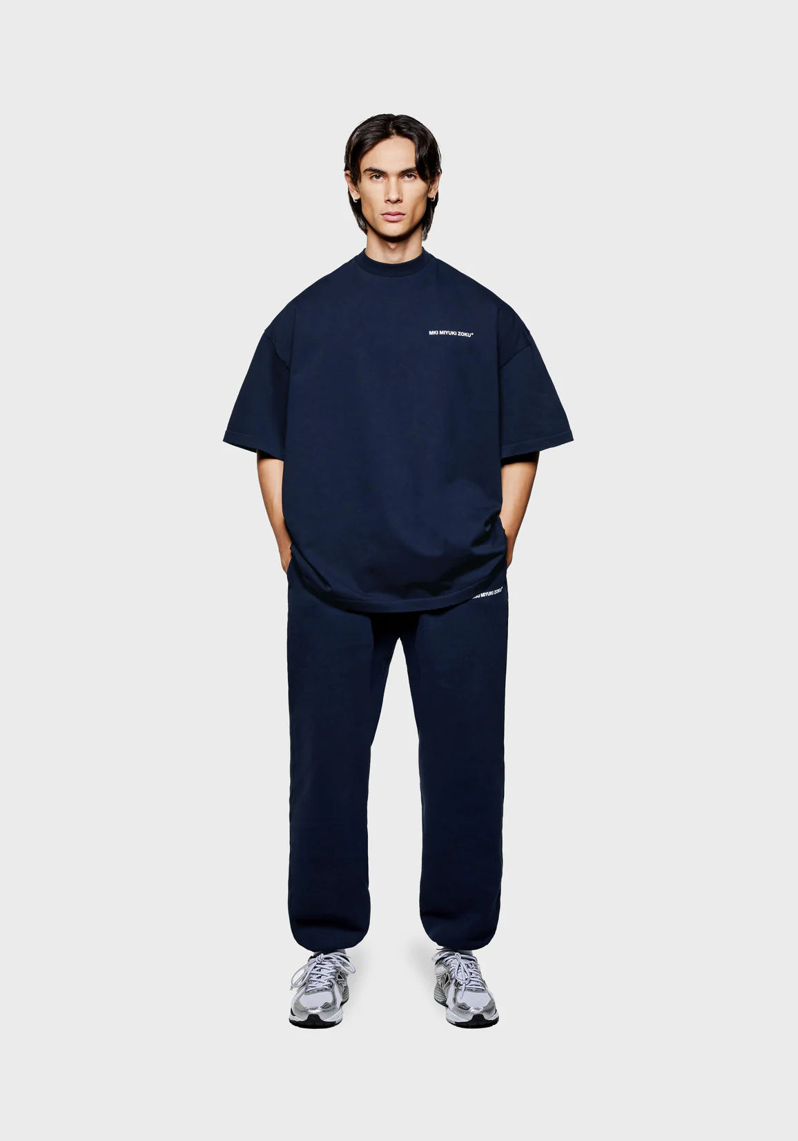 MKI Miyuki Zoku Uniform T-Shirt in Navy. Shot at EQVVS. Full length shot. 