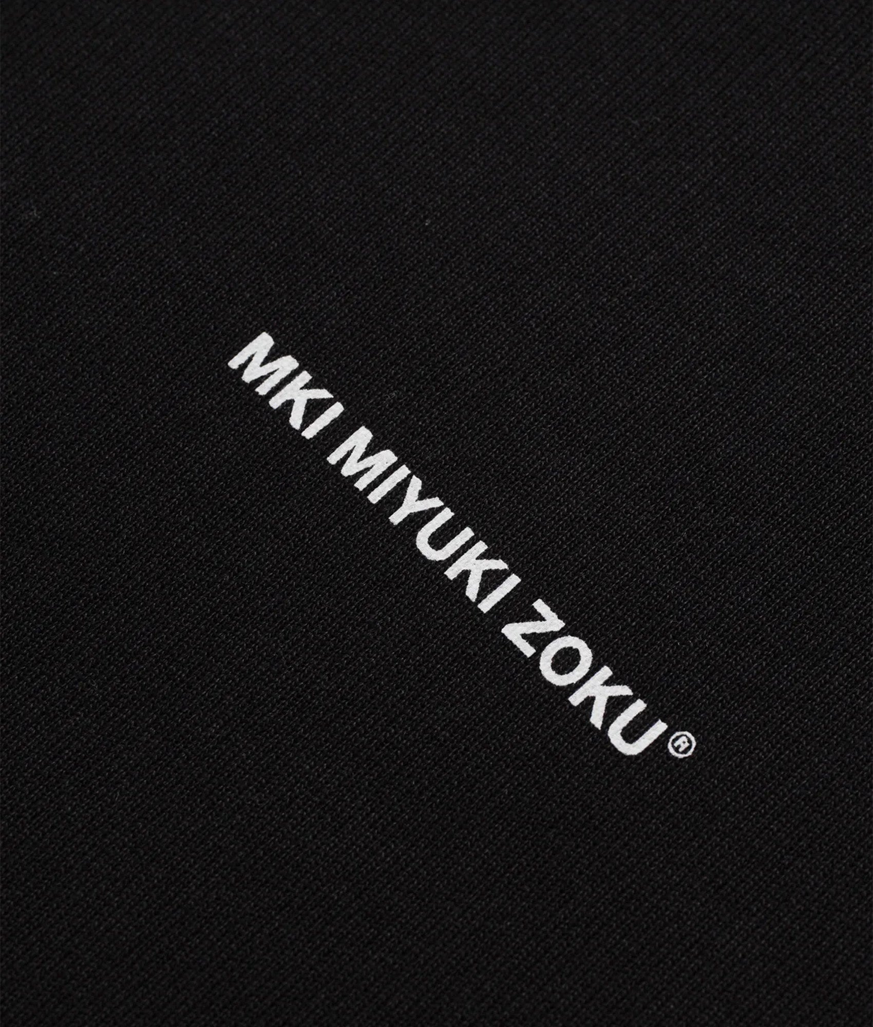 MKI MIYUKI ZOKU Oversized Uniform zip through hoodie in Black at EQVVS Menswear. Detail shot.