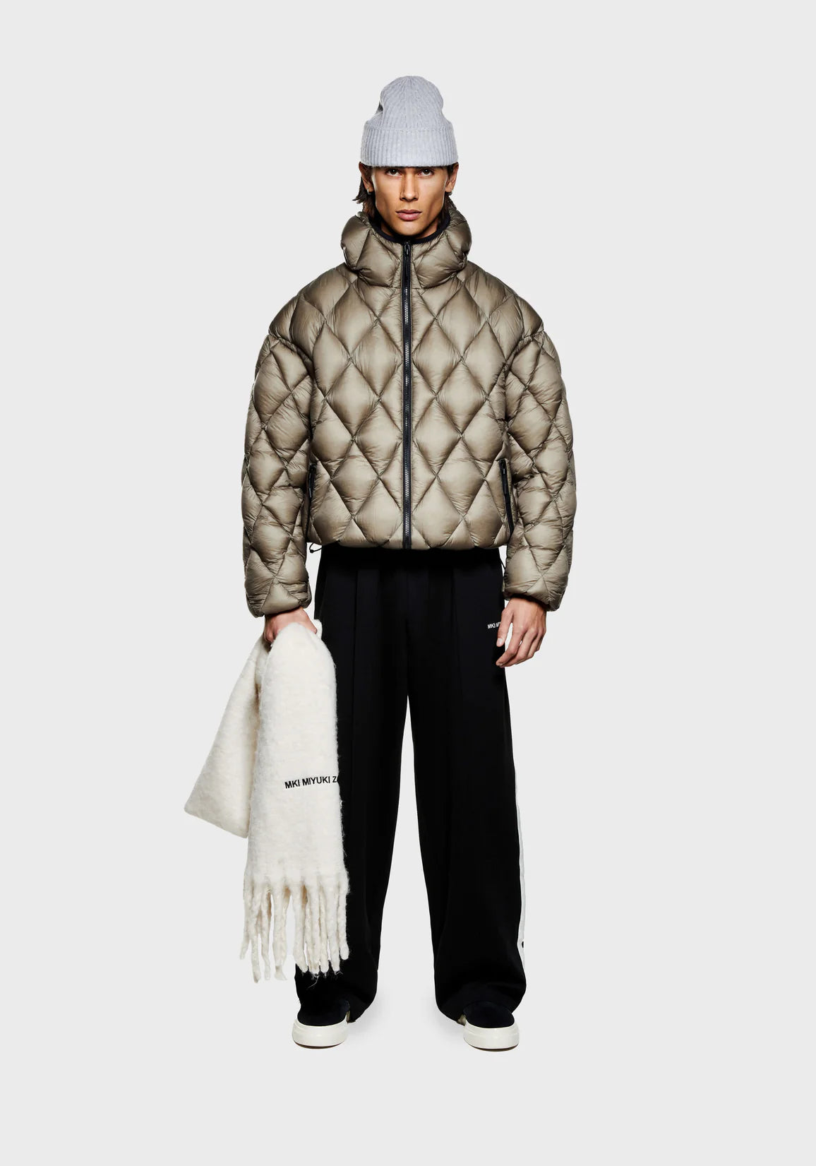 MKI Diamond Quilted Bubble Jacket. Khaki. Model shot. 