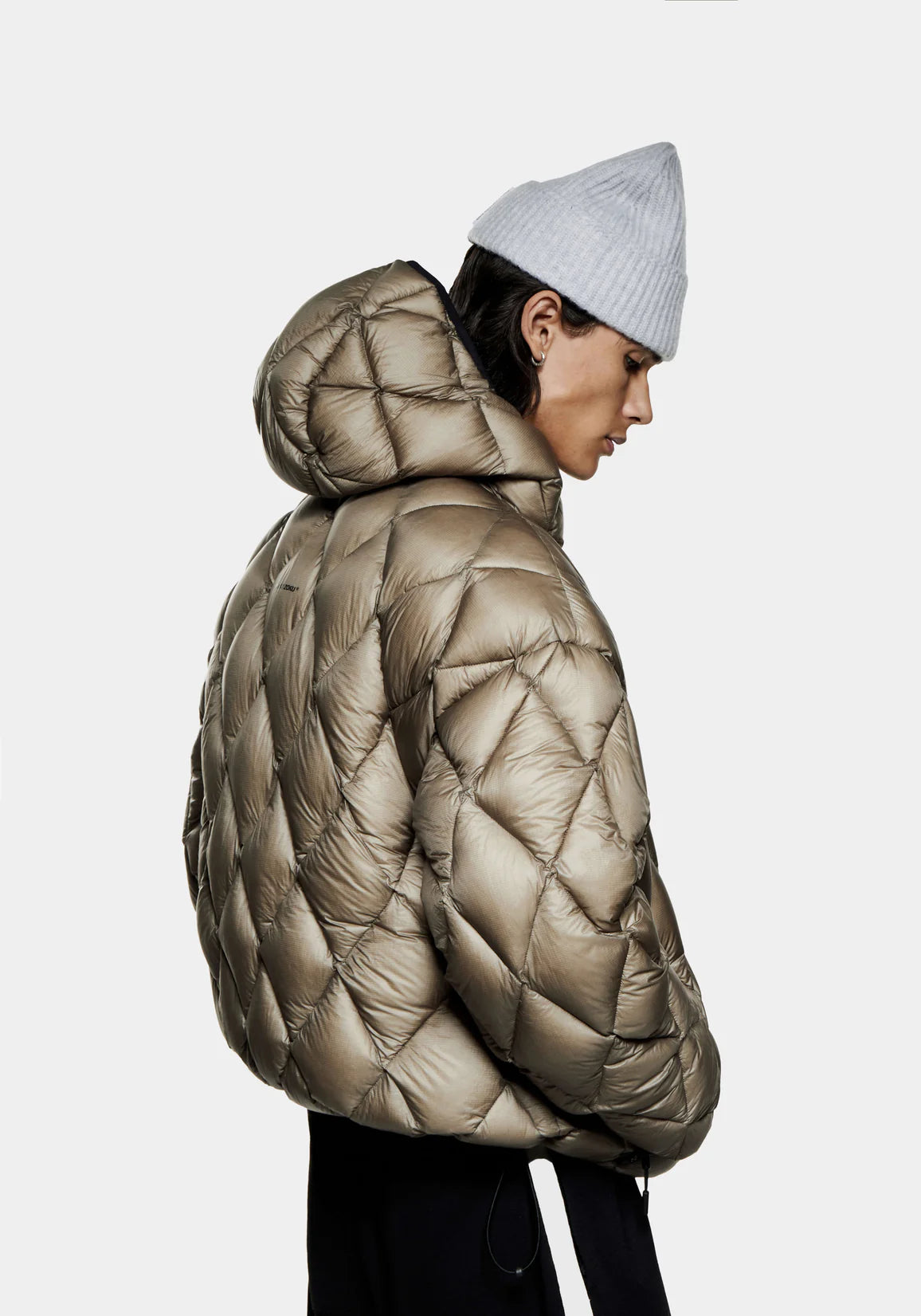 MKI Diamond Quilted Bubble Jacket. Khaki. Model shot. 