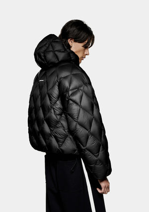 Diamond Bubble Jacket in black by MKI Miyuki Zoku. Model shot.