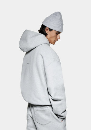 MKI MIYUKI ZOKU 800 GSM Superweight Hoodie in Grey at EQVVS. Side Model Shot. 