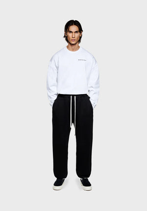 Relaxed Fit 800 GSM Superweight Cuffed Joggers by MKI MIYUKI ZOKU at EQVVS Menswear. Front Model Shot.