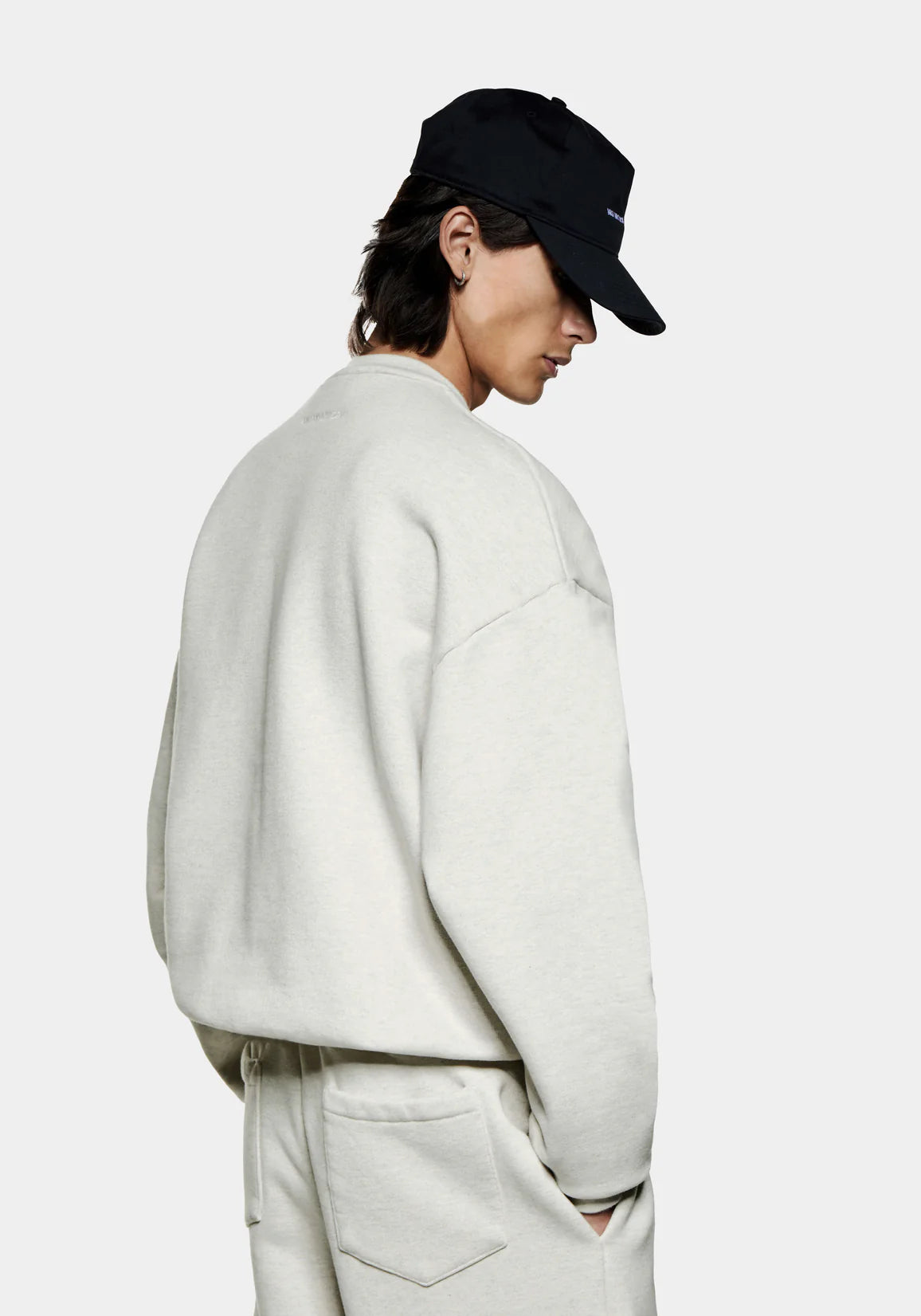 MKI MIYUKI ZOKU Oversized 800 GSM Superweight Sweatshirt in Oatmeal at EQVVS Menswear. Side Model Shot. 