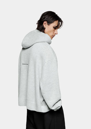 MKI MIYUKI ZOKU Mohair Blend Knit Hoodie in Light Grey at EQVVS Menswear. Side Model Shot.